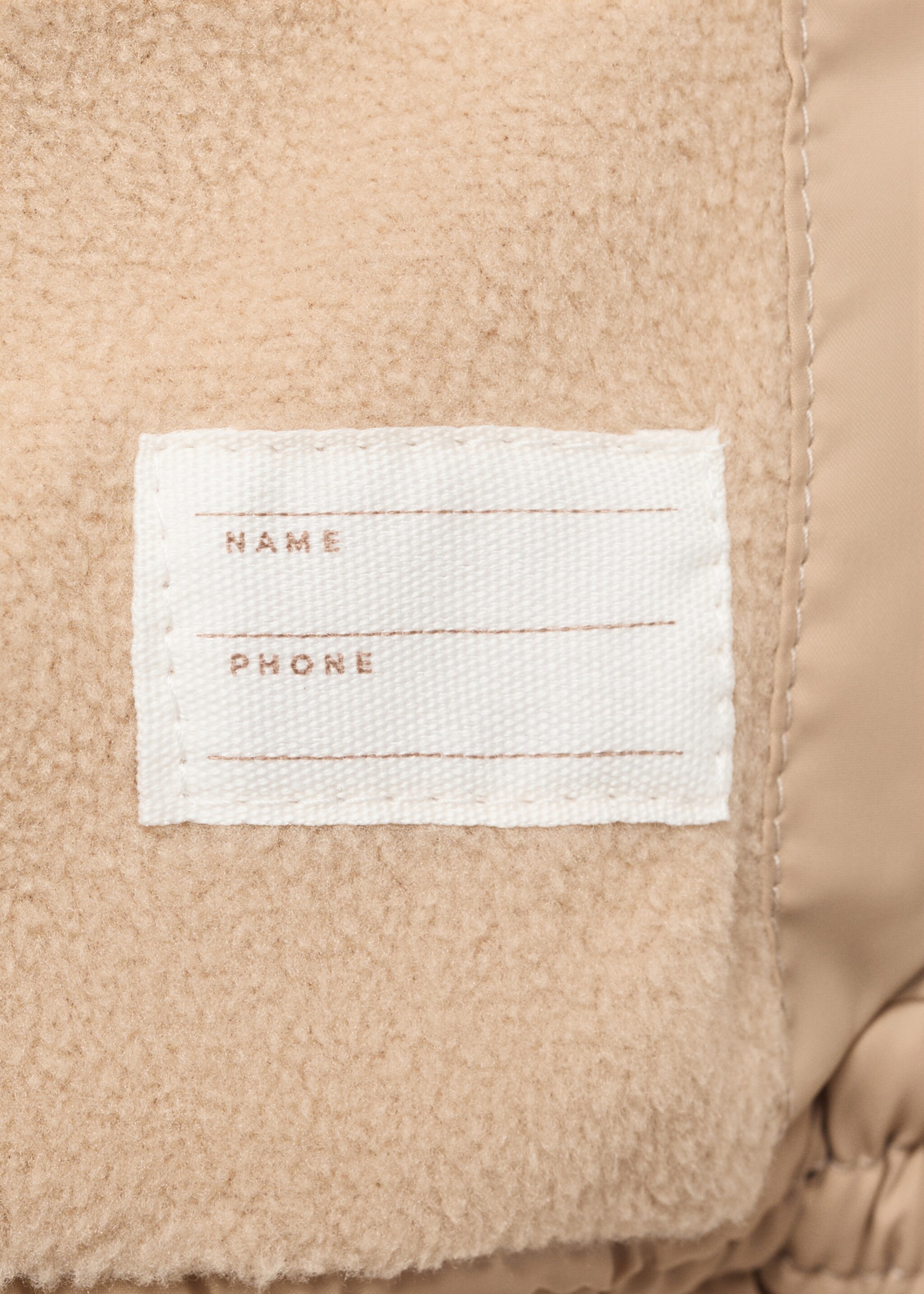 Gilet matelassé à capuche - Détail de l'article 0
