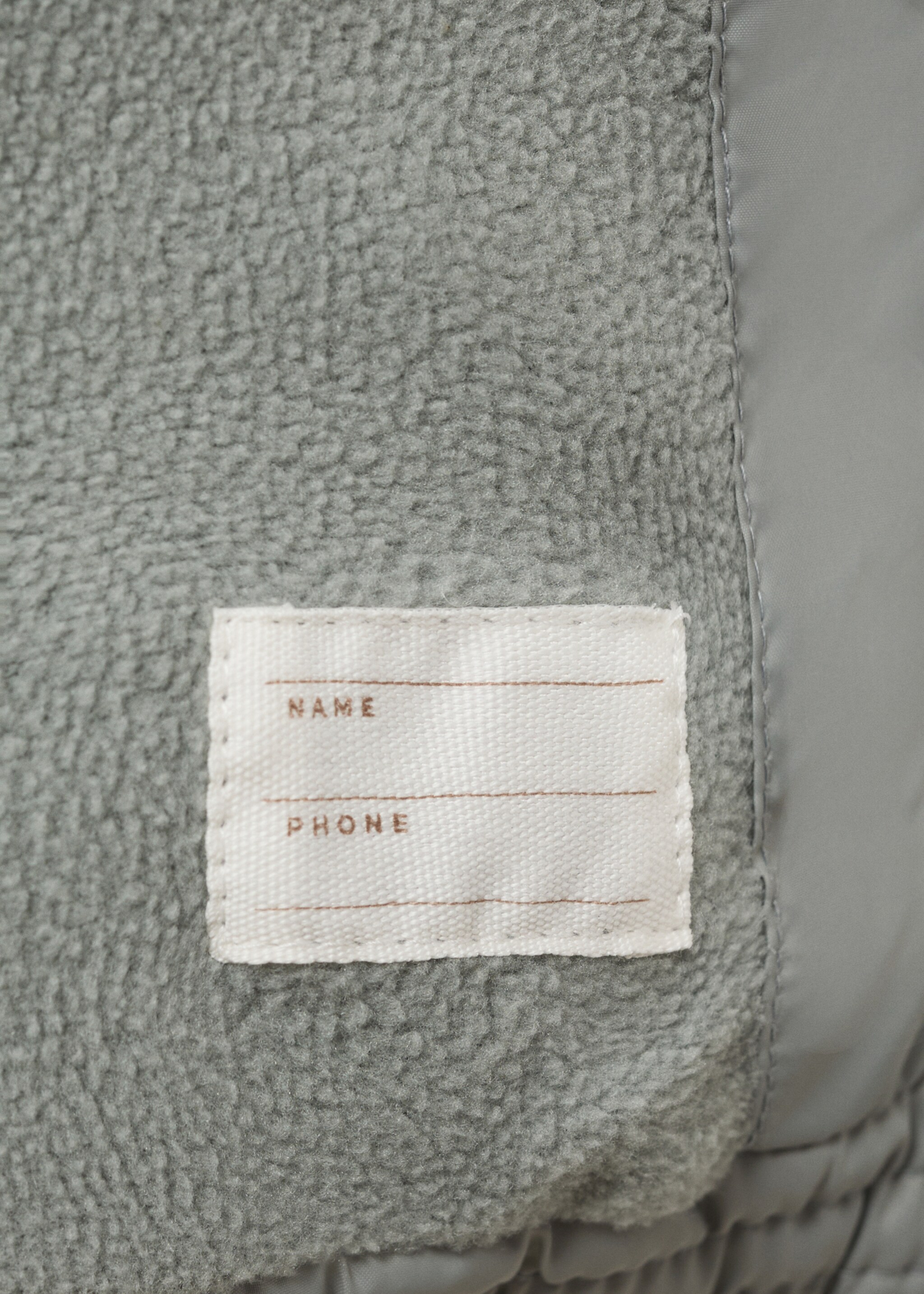 Gilet matelassé à capuche - Détail de l'article 8