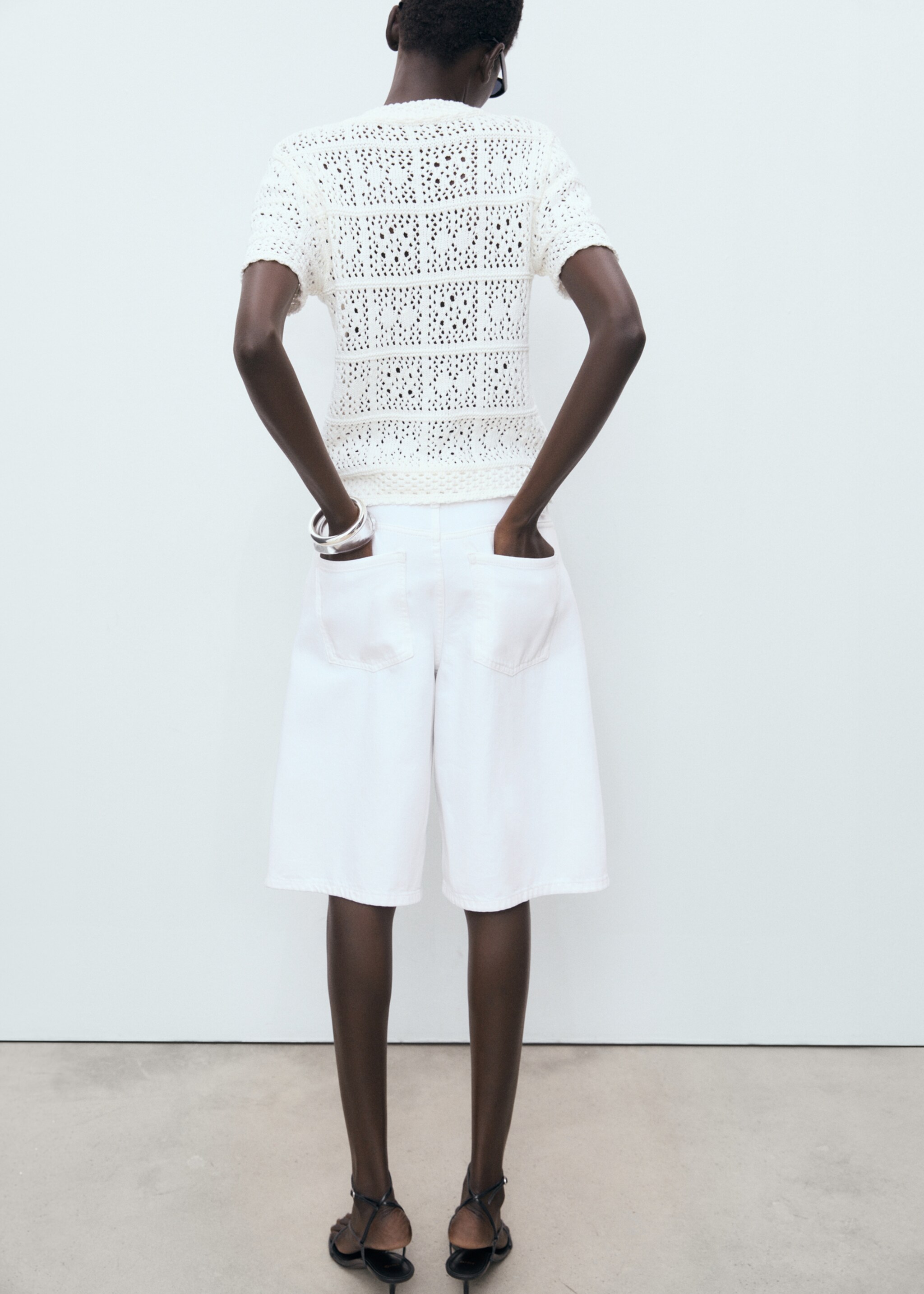Short-sleeved crochet cardigan - Reverse of the article
