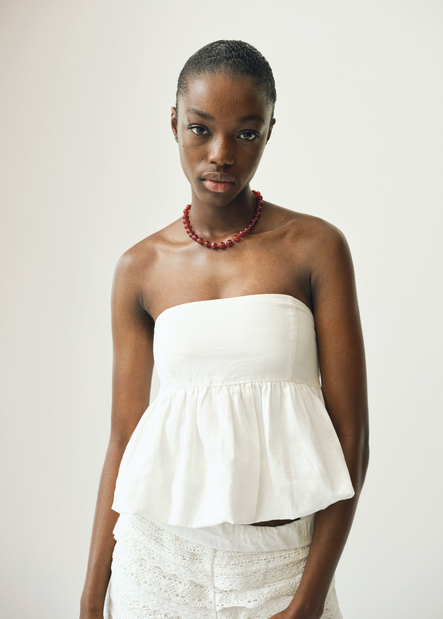 Puffed strapless top Teen MANGO USA