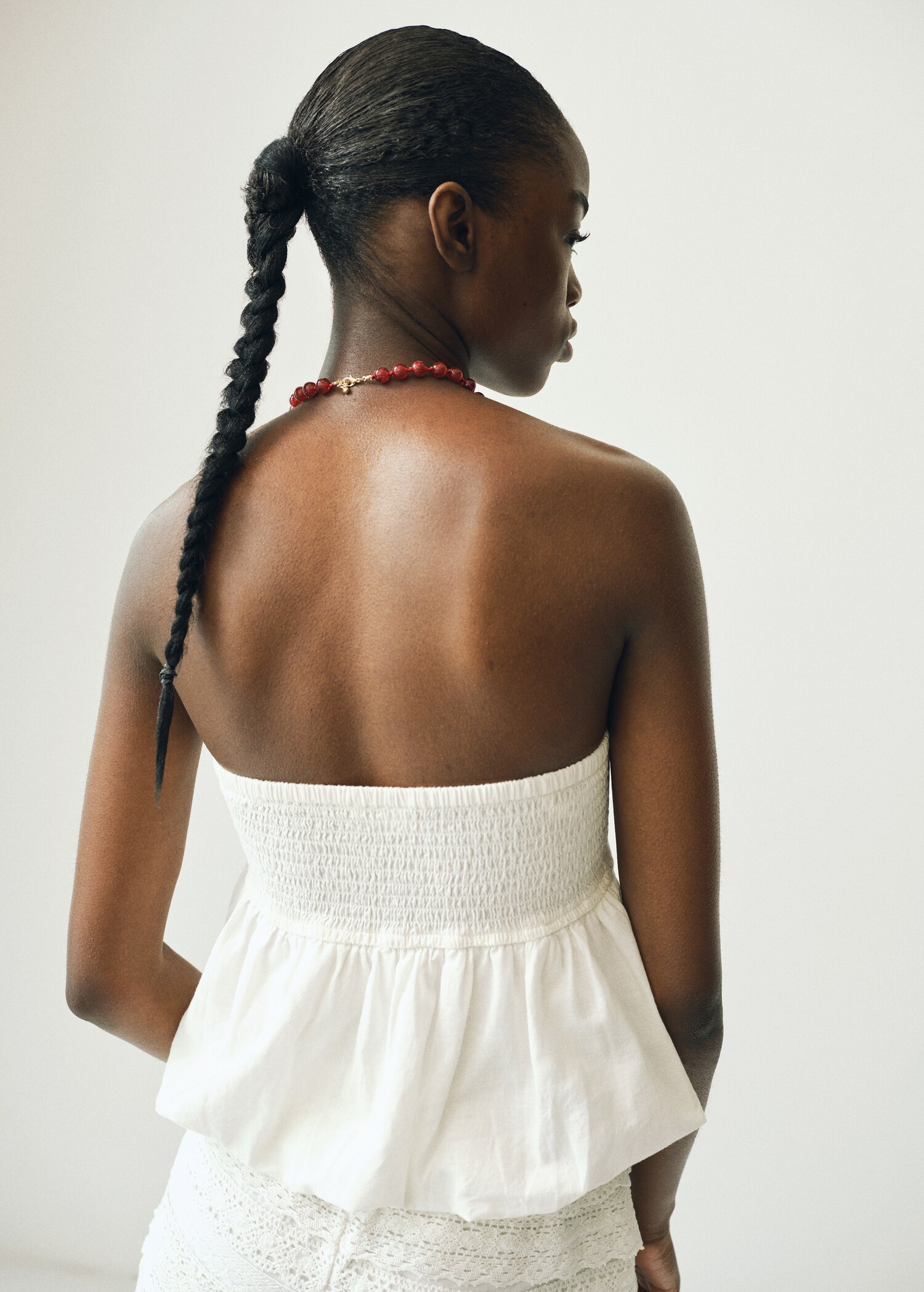 Puffed strapless top - Reverse of the article