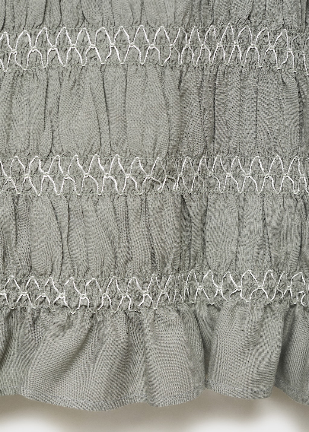 Ruffled blouse with embroidered details