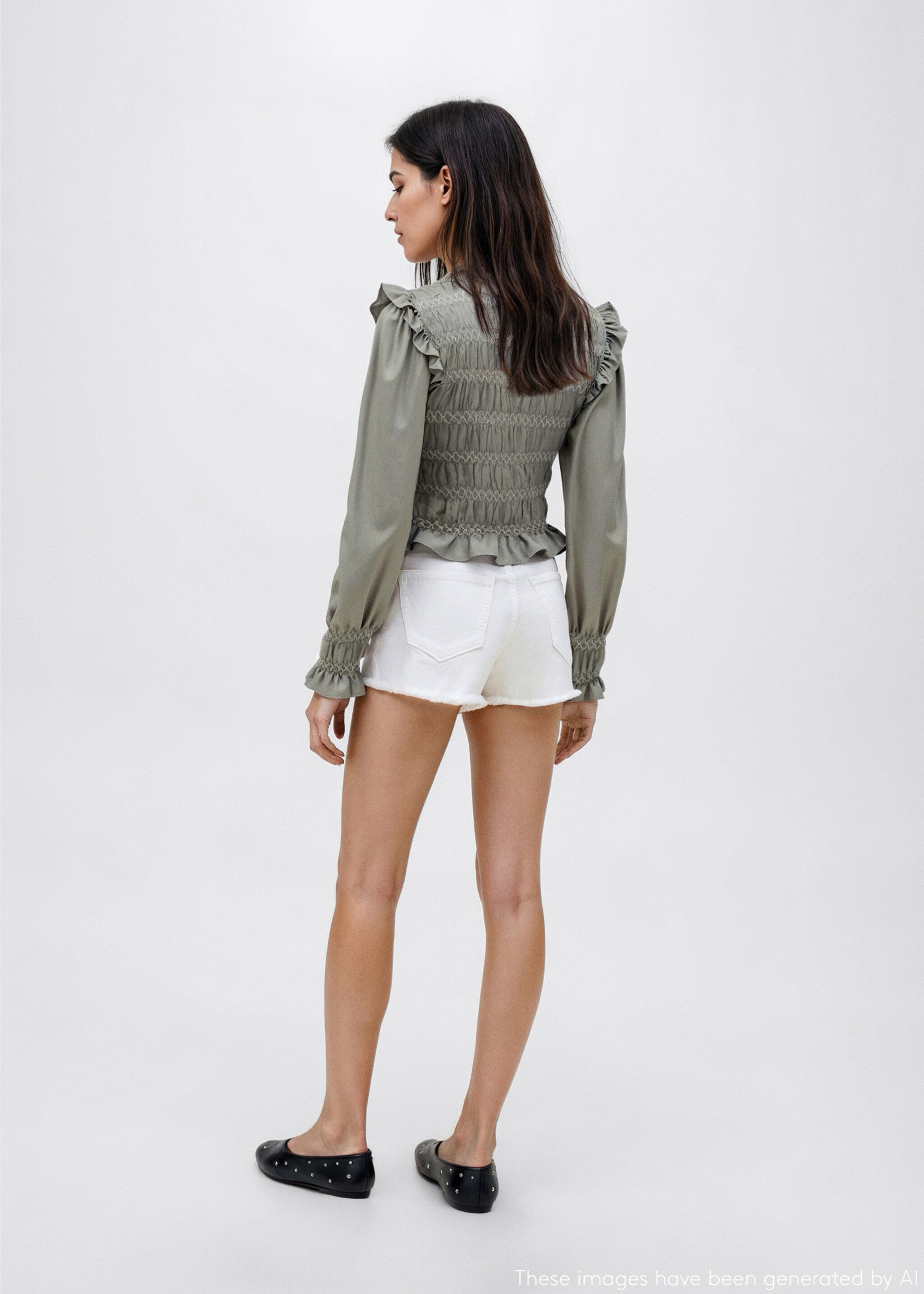 Ruffled blouse with embroidered details - Reverse of the article