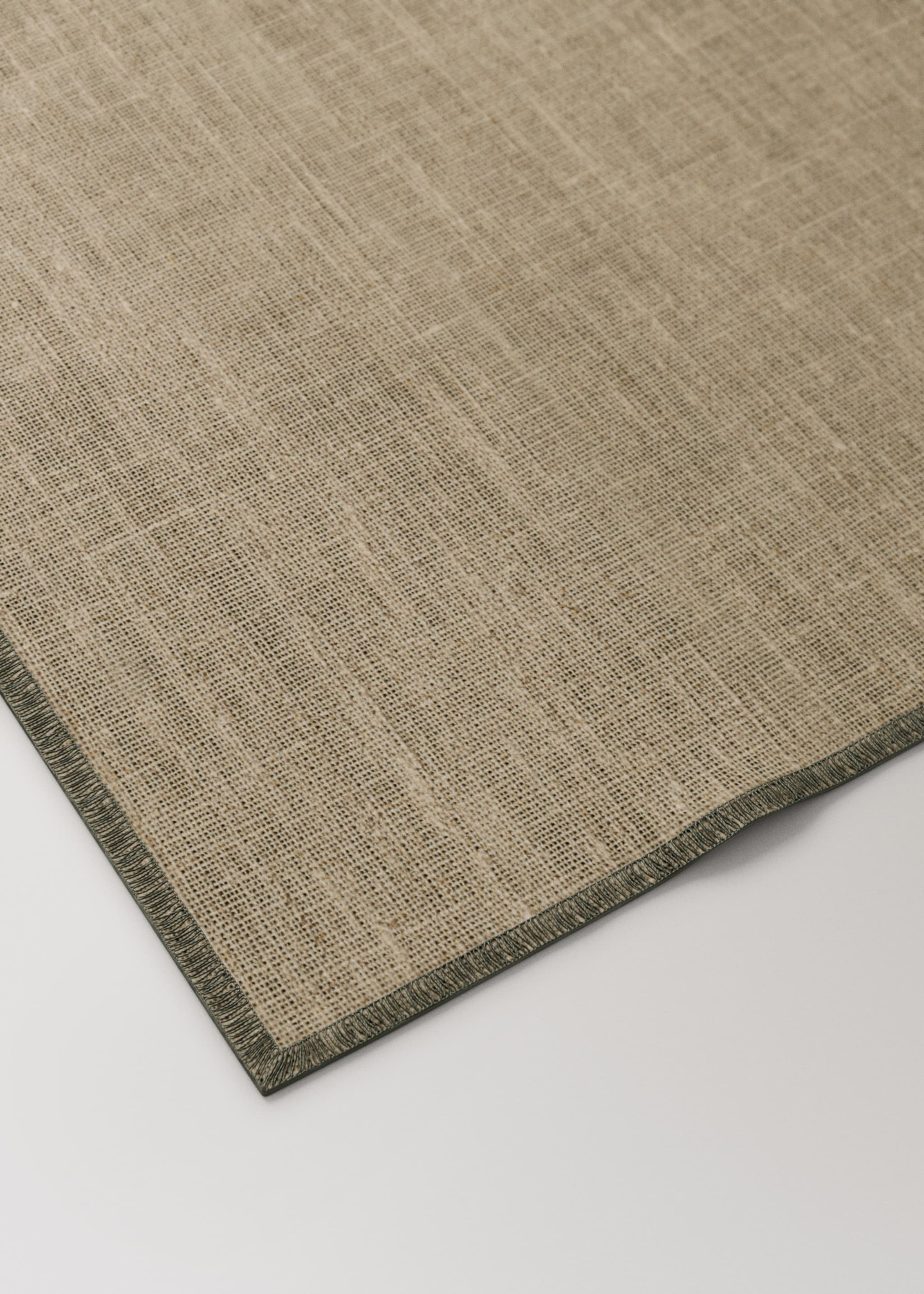 Linen tablecloth resinated linen overlock contrast - Details of the article 1