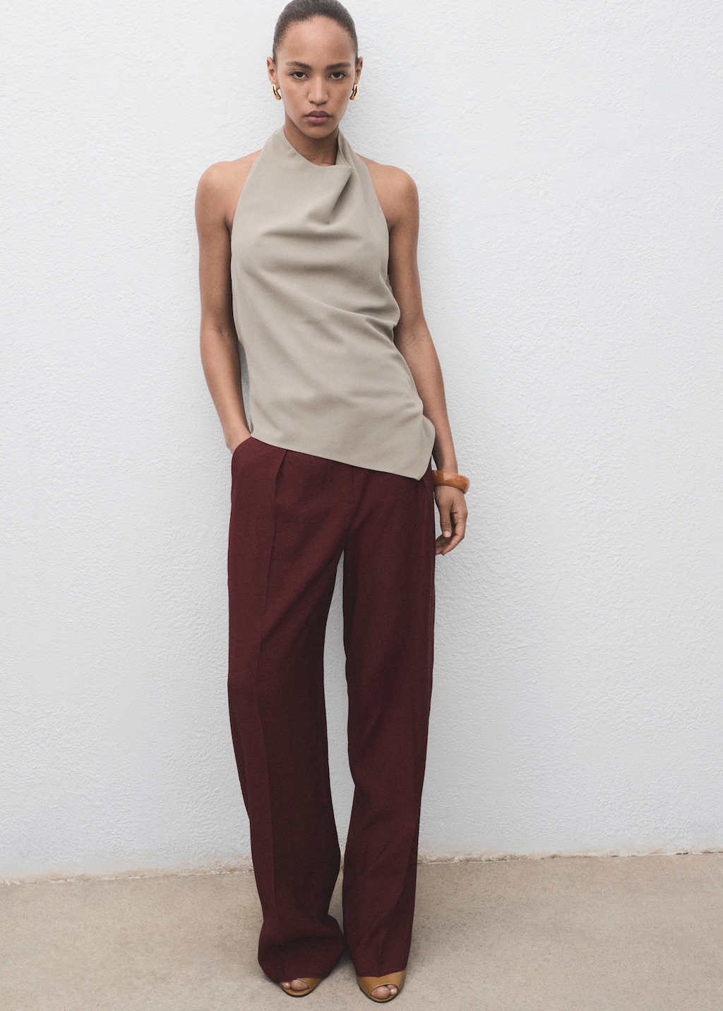 Asymmetrical open-back top