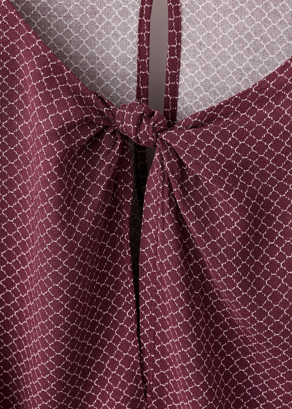 Puff-sleeved blouse with knot