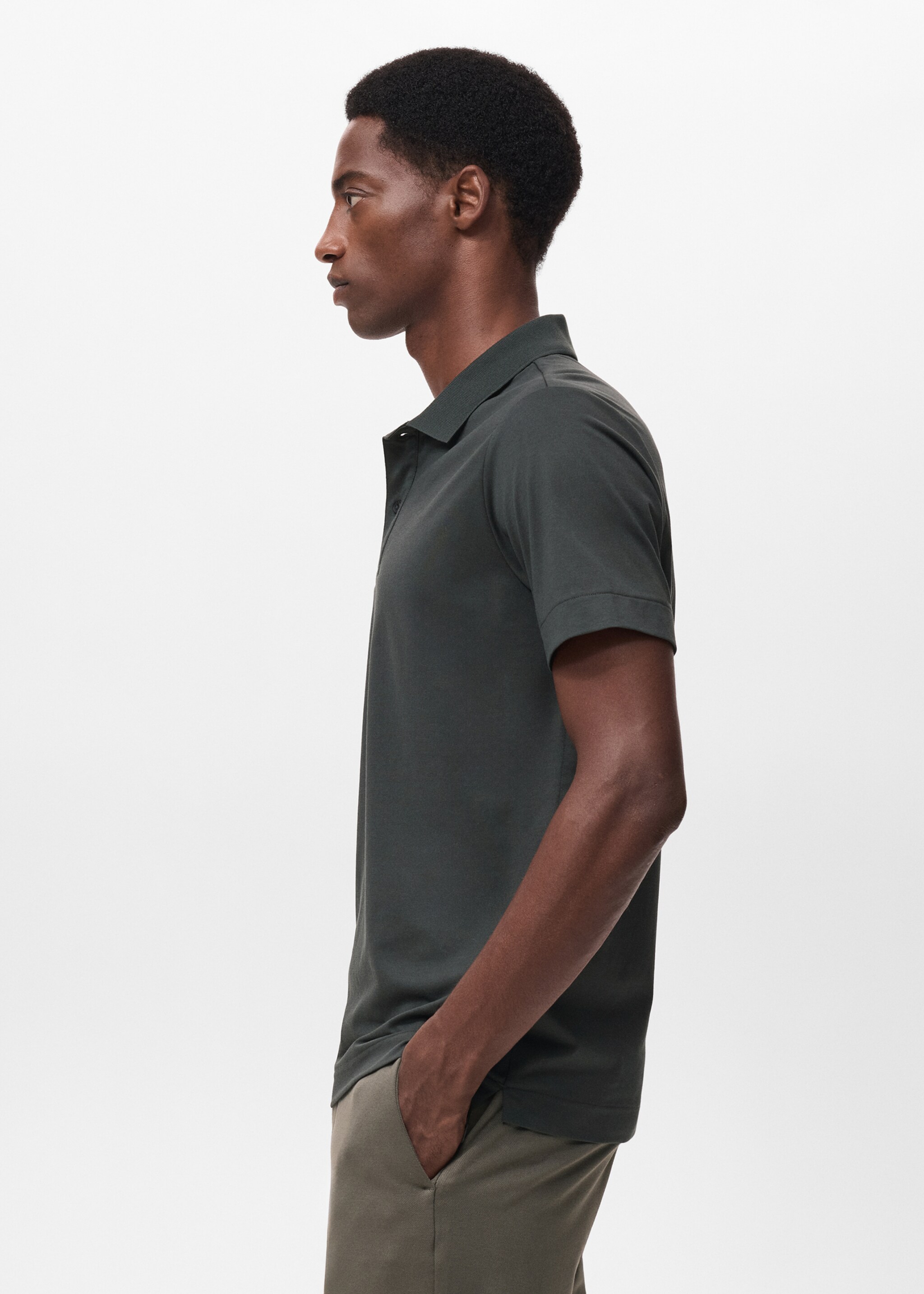 Slim-fit Thermolite® polo shirt - Details of the article 2, Dark Green. Ref: 17035977-00.