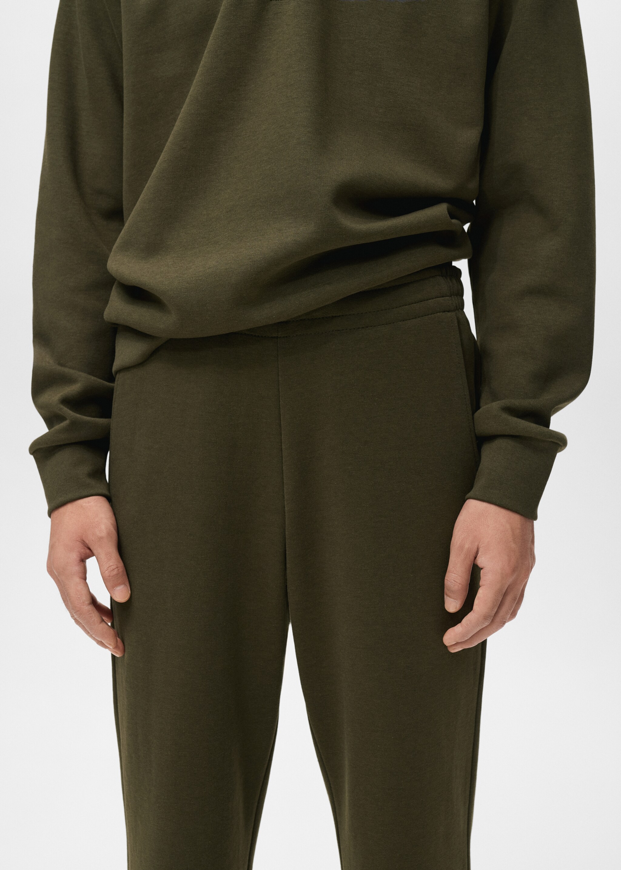 Cotton joggers with elastic waist - Details of the article 1, Olive Green. Ref: 17035978-00.