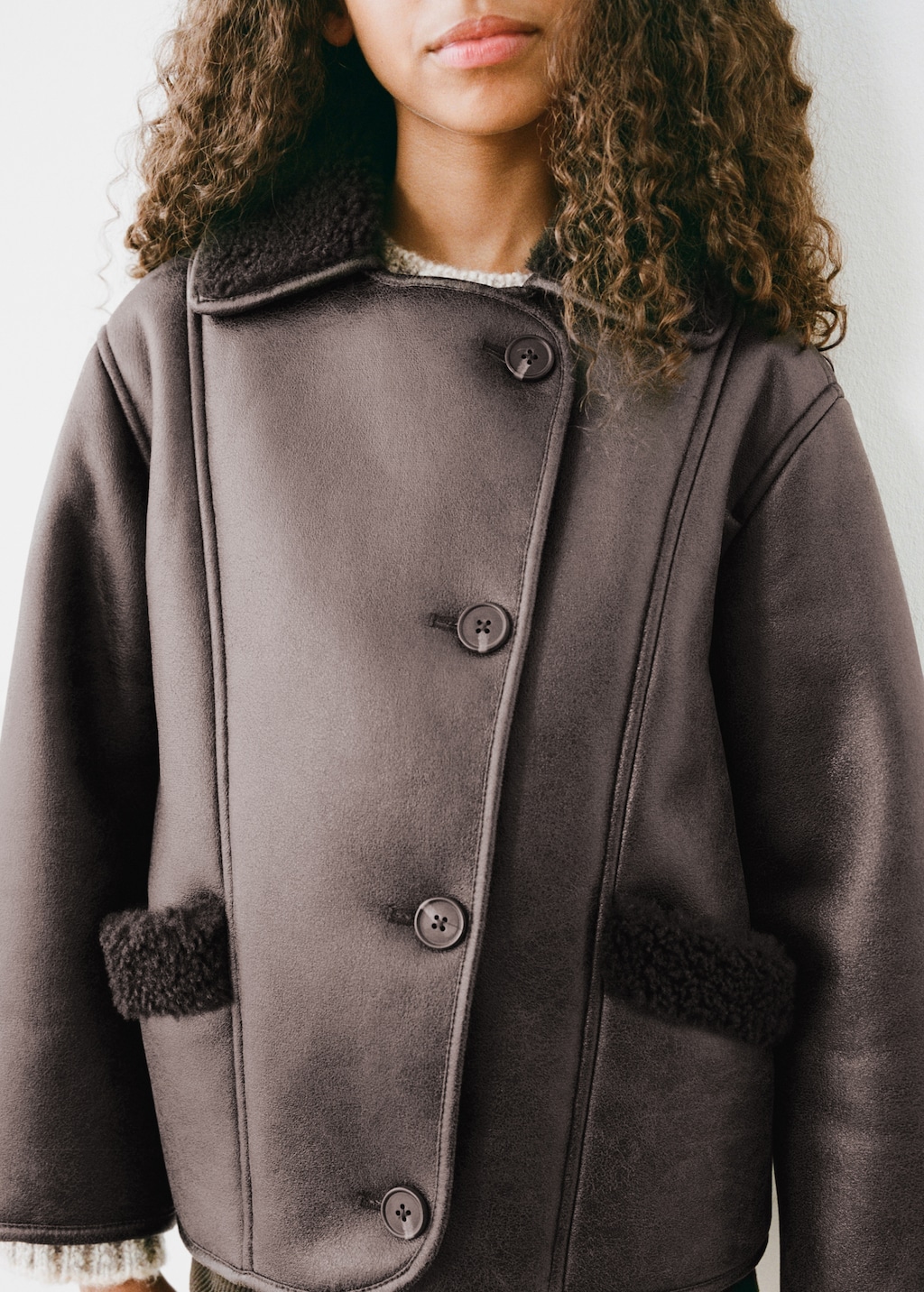 Coat with fur-effect lining