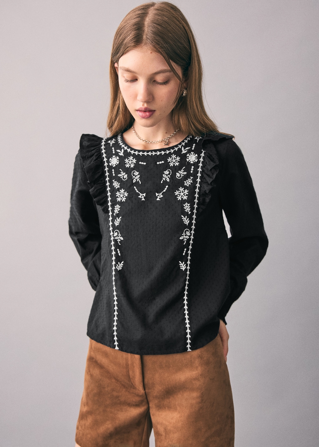 Ruffled embroidered blouse