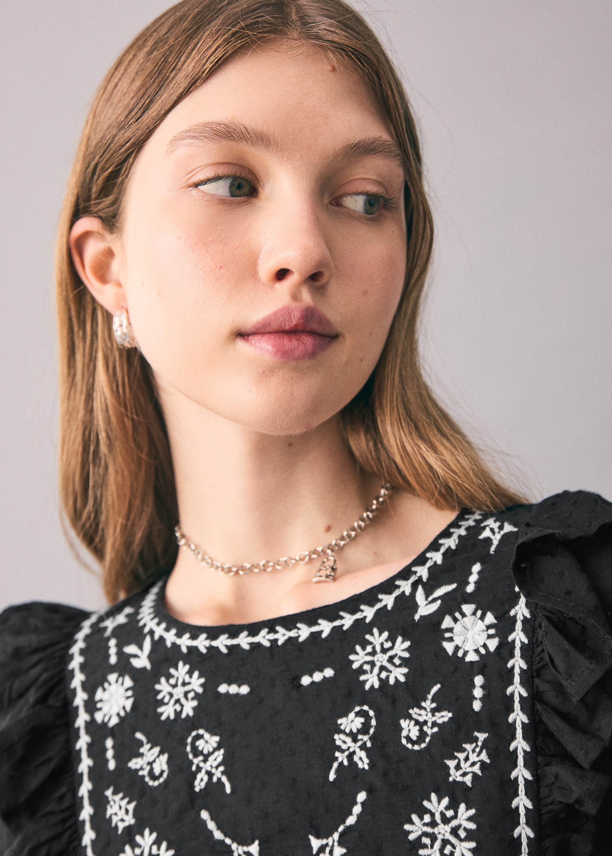 Ruffled embroidered blouse - Details of the article 1, Black. Ref: 17036334-00.