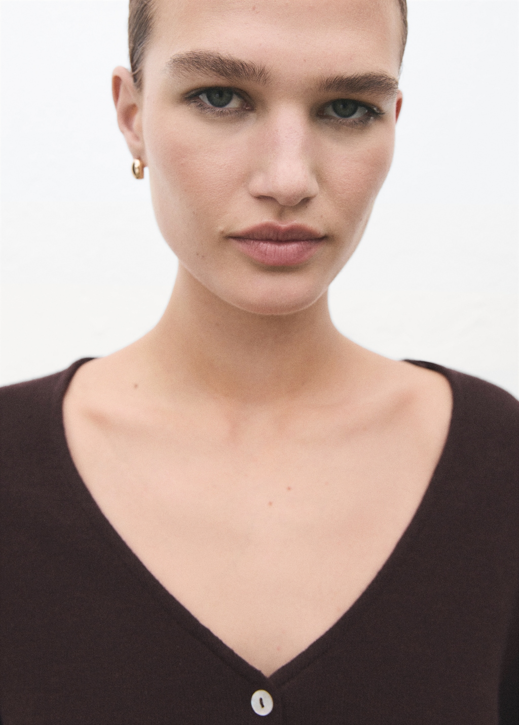 Knitted cardigan with bow