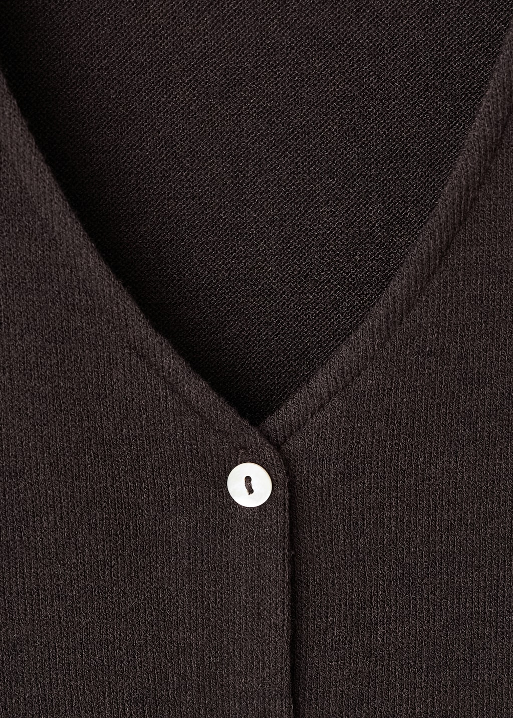 Knitted cardigan with bow