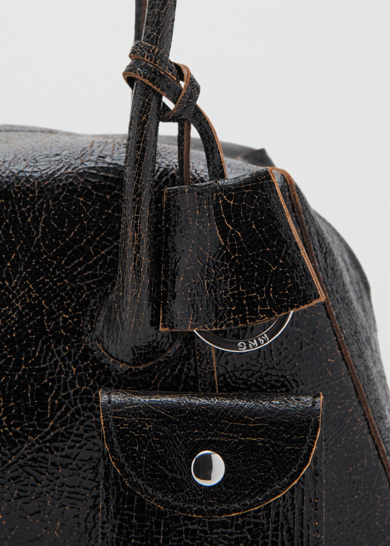Schultertasche aus Leder mit Charms - Detail des Artikels 1