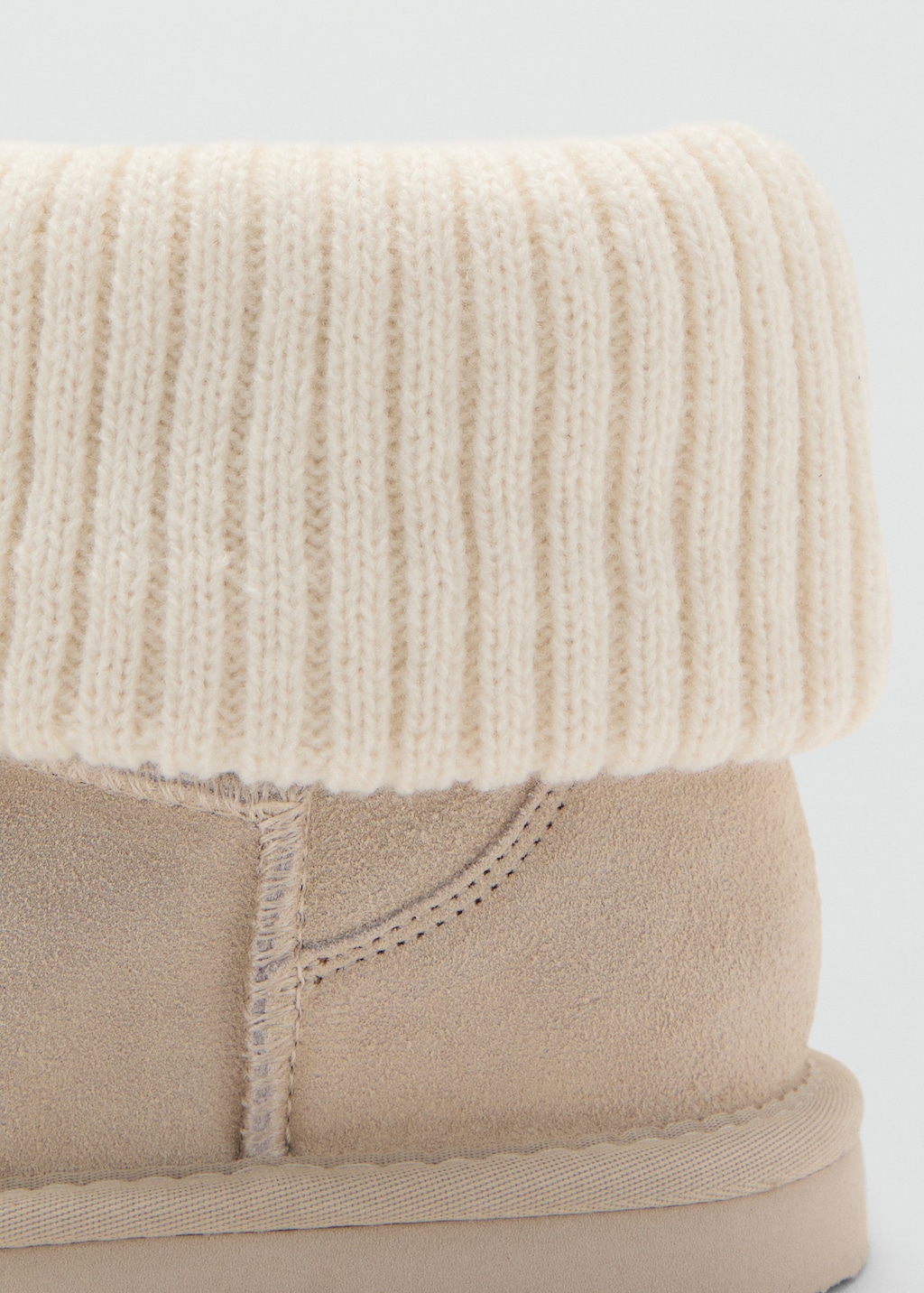 Leather ankle boots with knitted detail