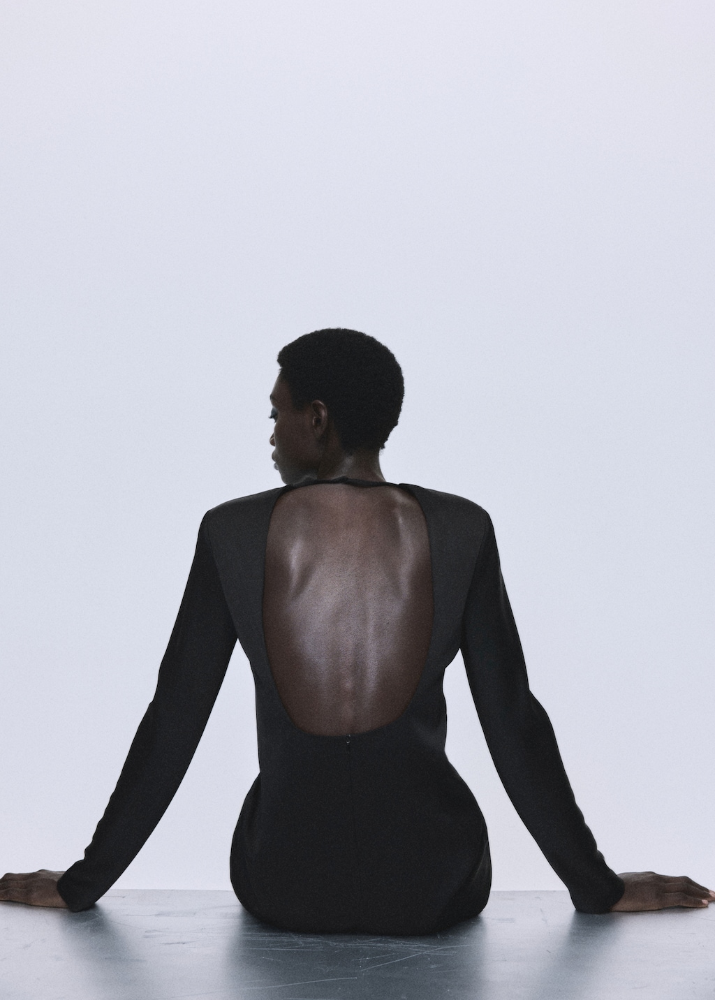 Open-back dress with lace trim hem