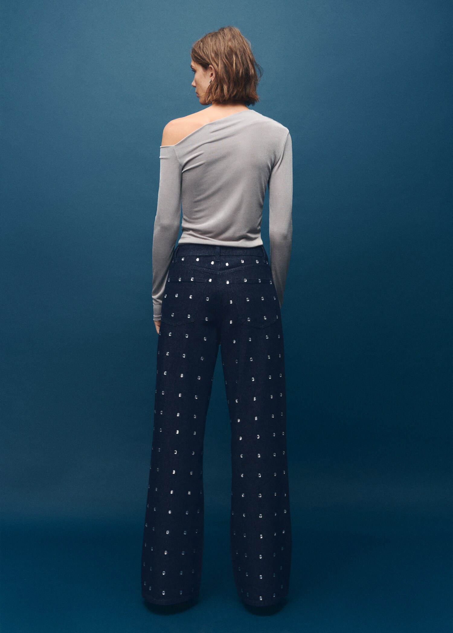 Wide-leg jeans with crystals - Reverse of the article