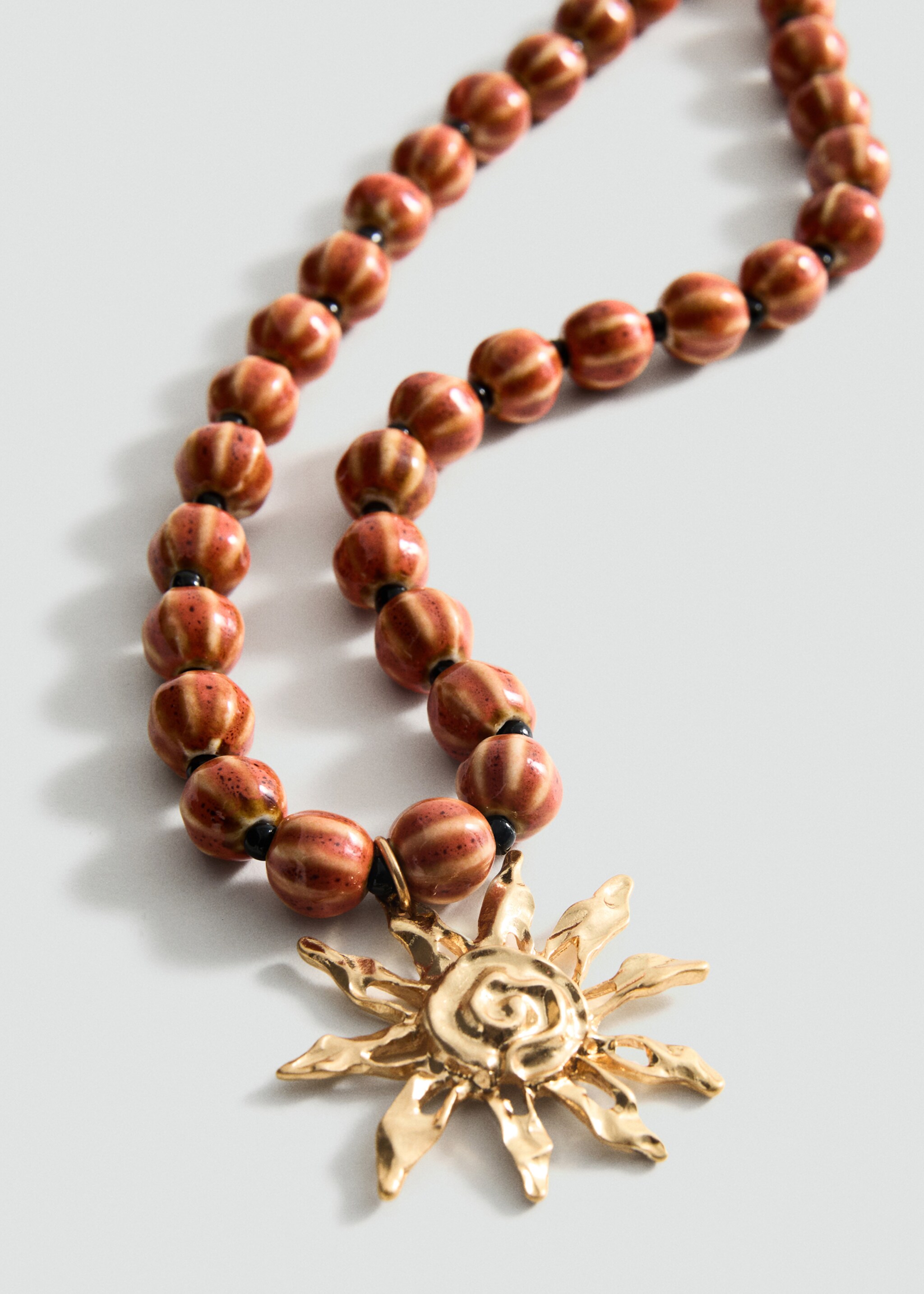 Ceramic ball necklace with sun pendant - Medium plane