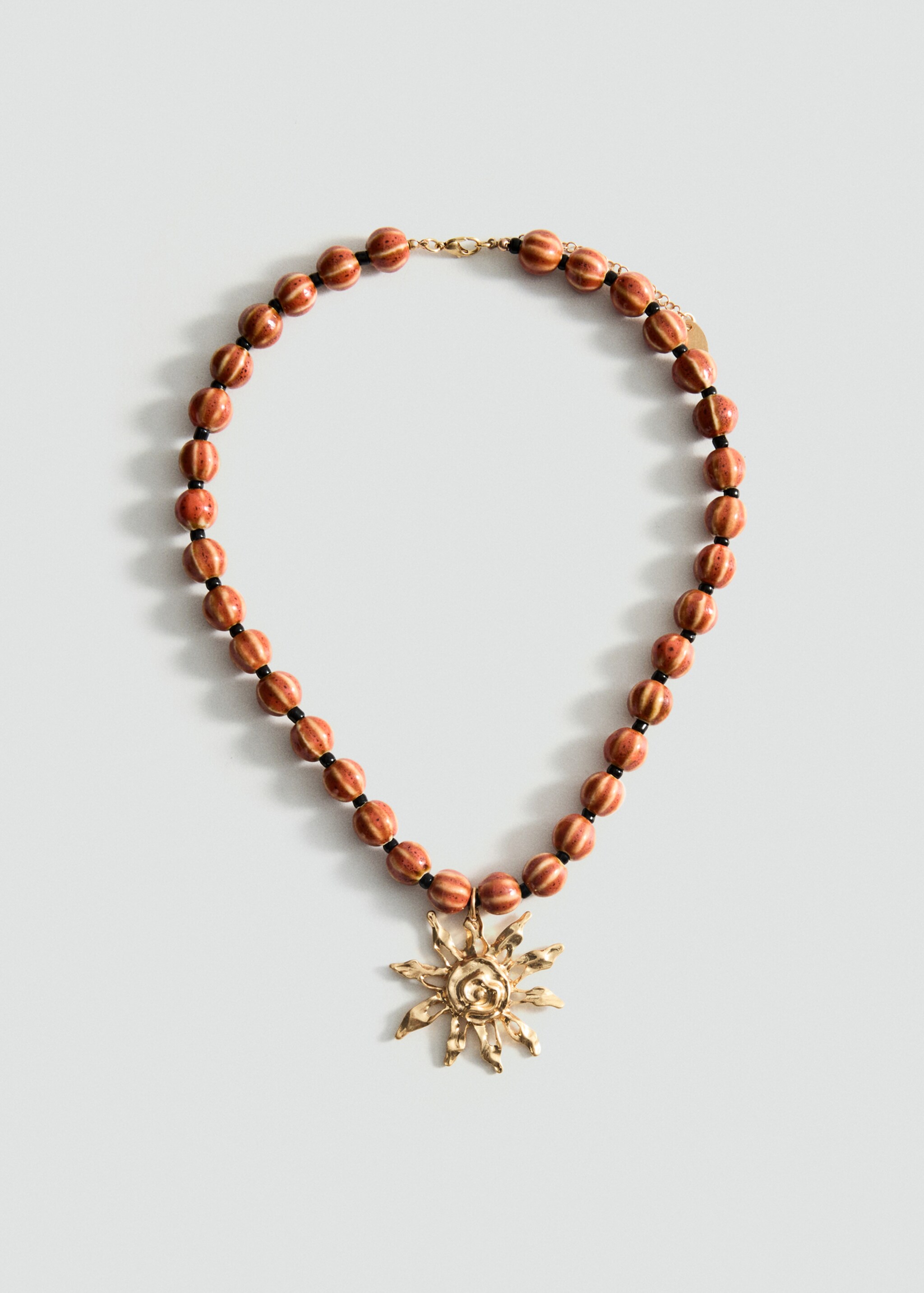 Ceramic ball necklace with sun pendant - Article without model