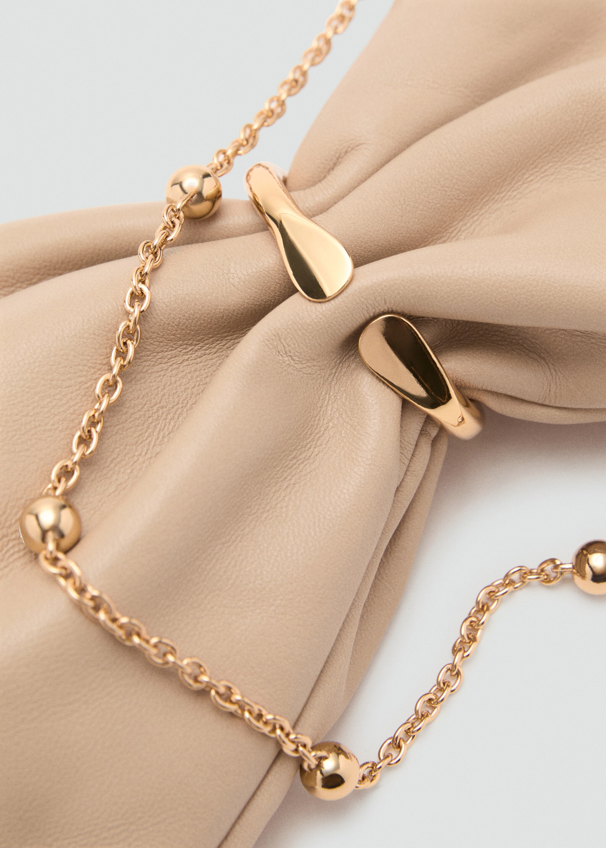 Leather sack-style bag with metallic detail - Details of the article 1