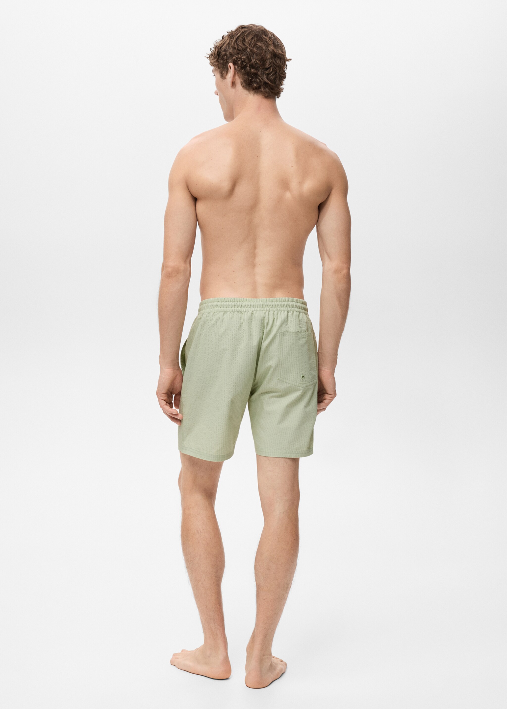 Seersucker swimming trunks - Reverse of the article