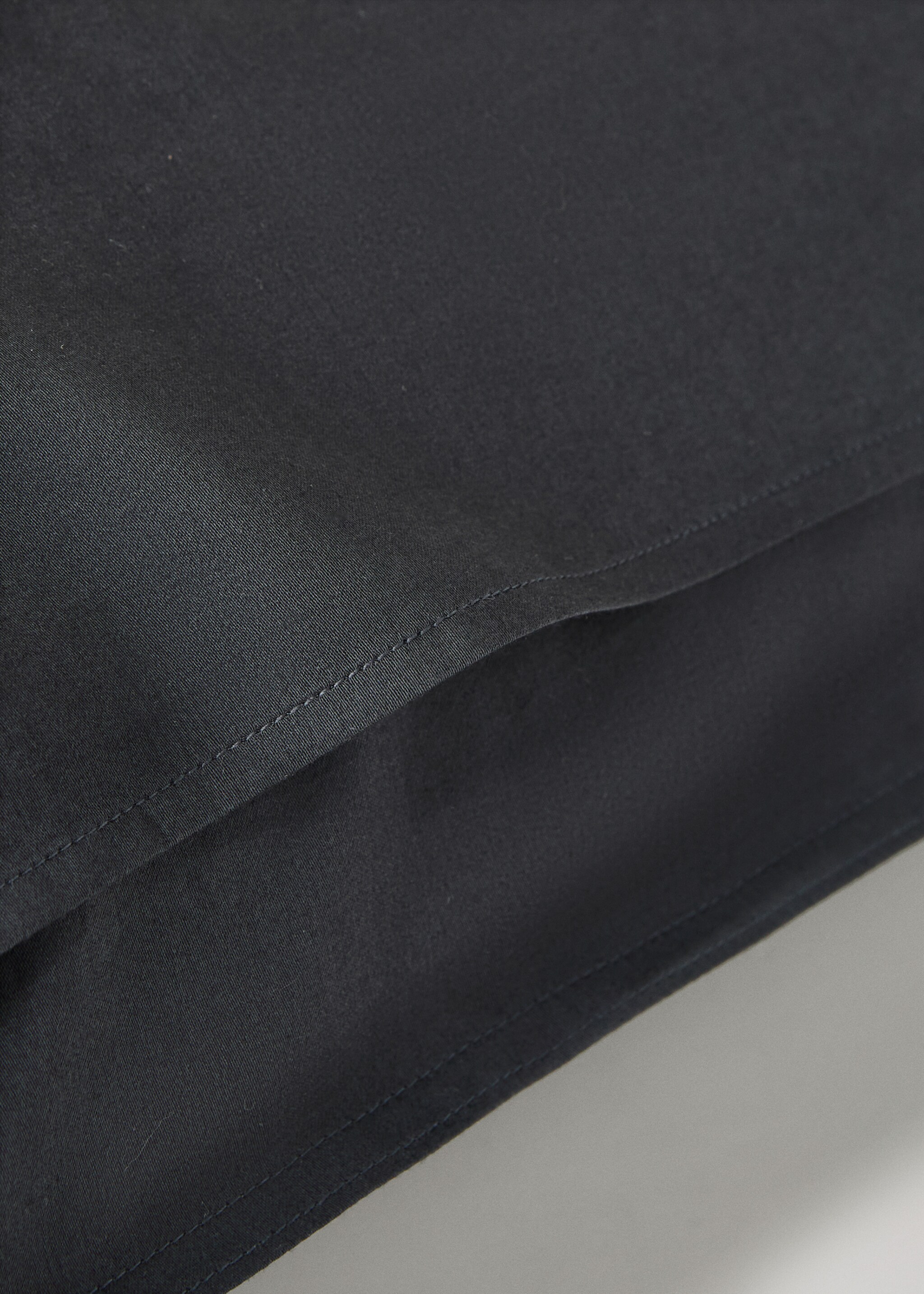 Two washed cotton satin pillowcases with double stitching 60x60 cm - Details of the article 2, Charcoal. Ref: 17041536-00.