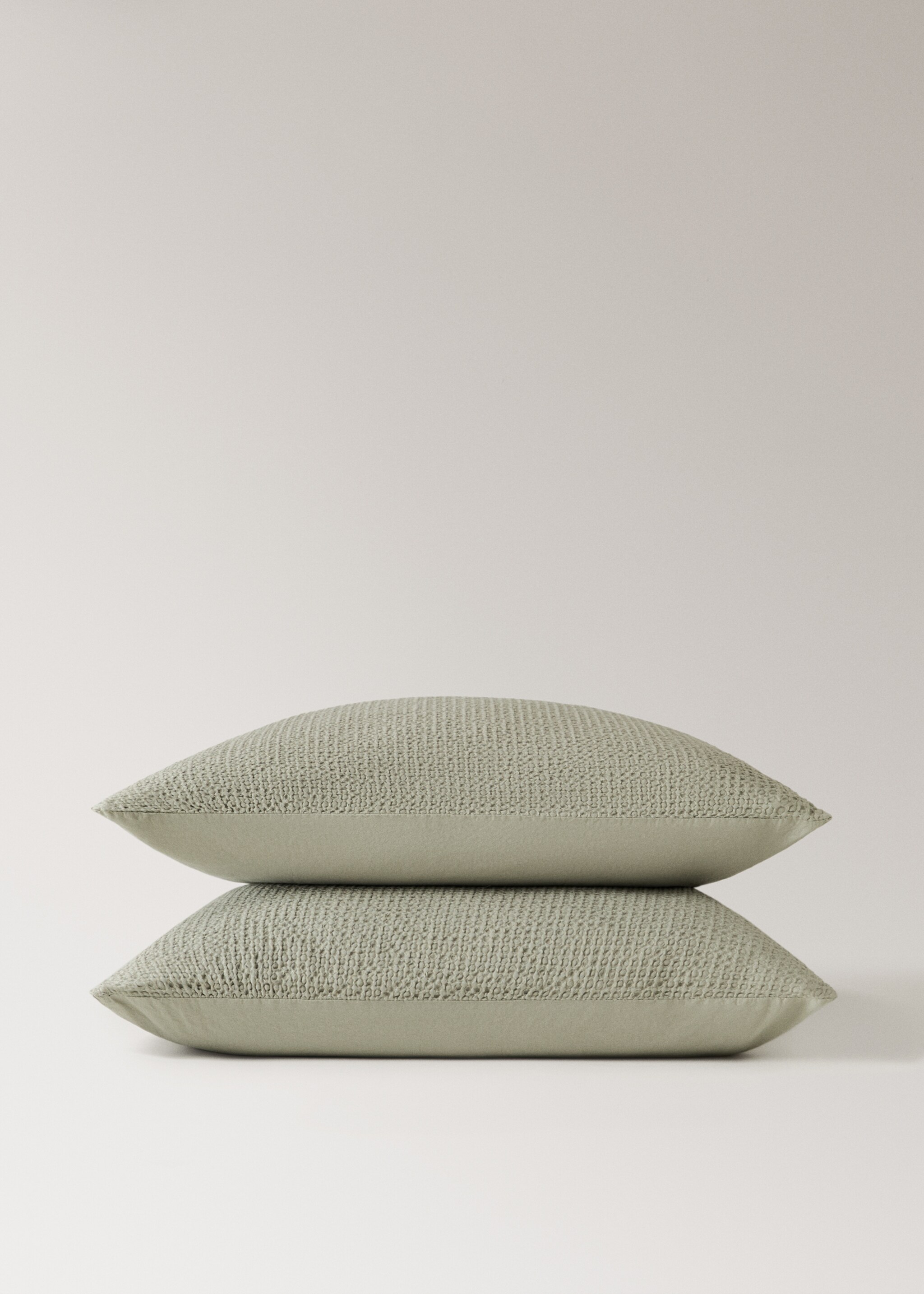 Deux taies d'oreiller en percale de coton gaufré 60x60 cm - Détail de l'article 1, Vert forêt. Ref: 17041548-00.