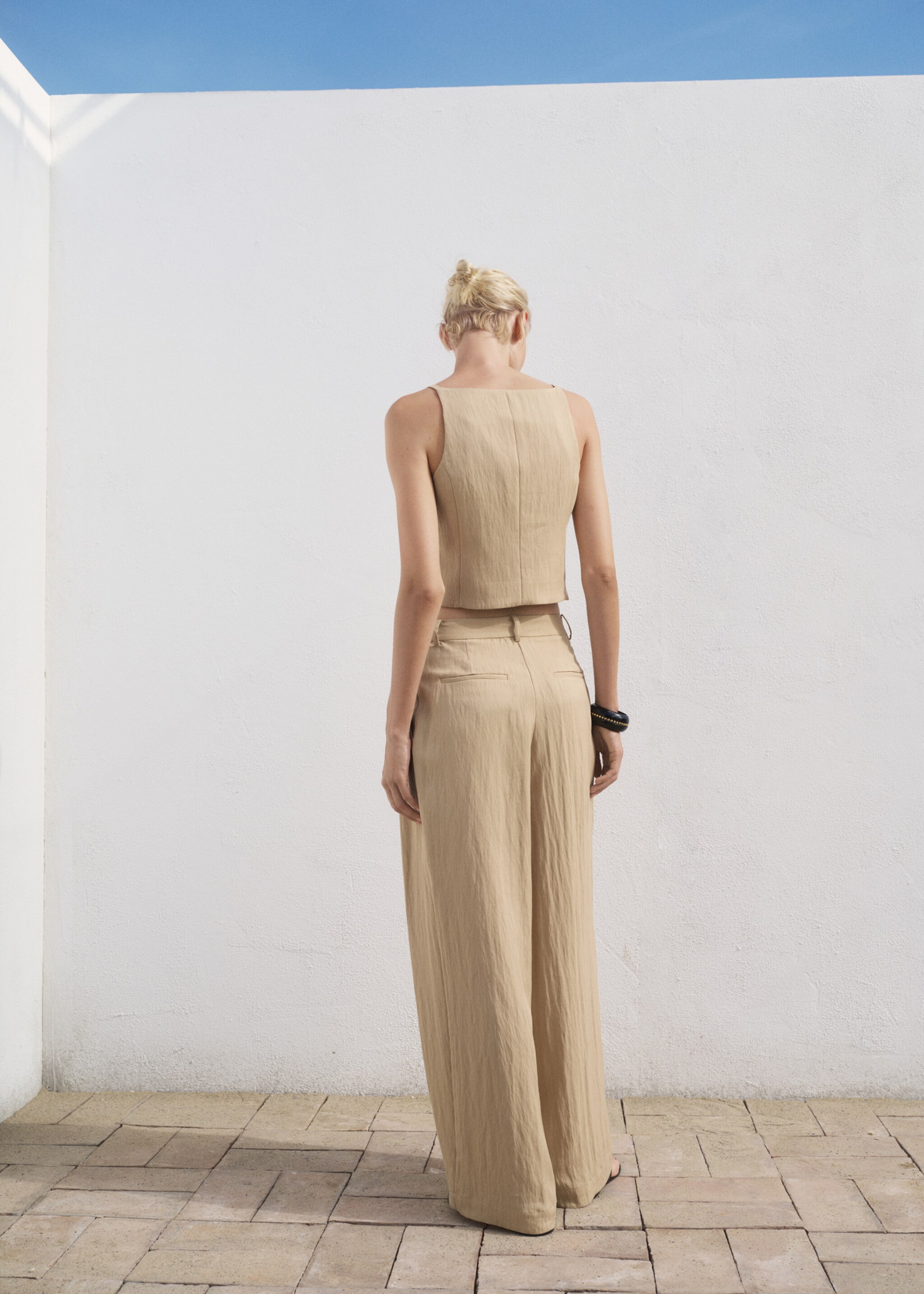 Pantalons rectes vestit tir mitjà - Revers de l'article