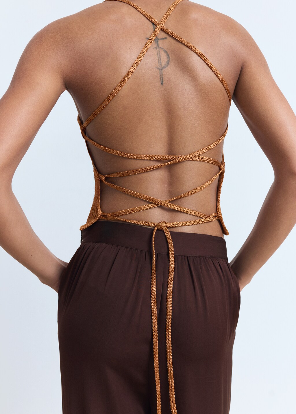 Lurex knitted top with crossed back