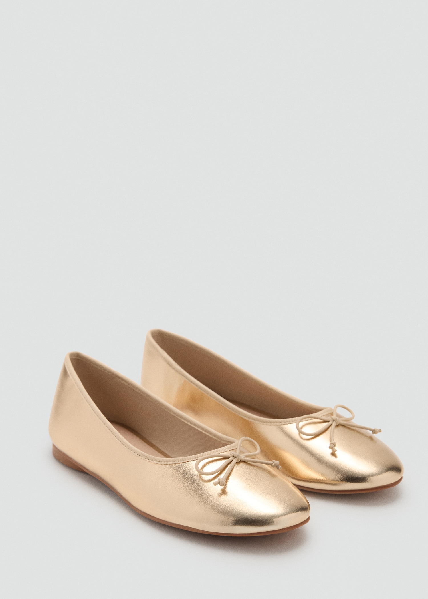 Metallic ballet flats with bow