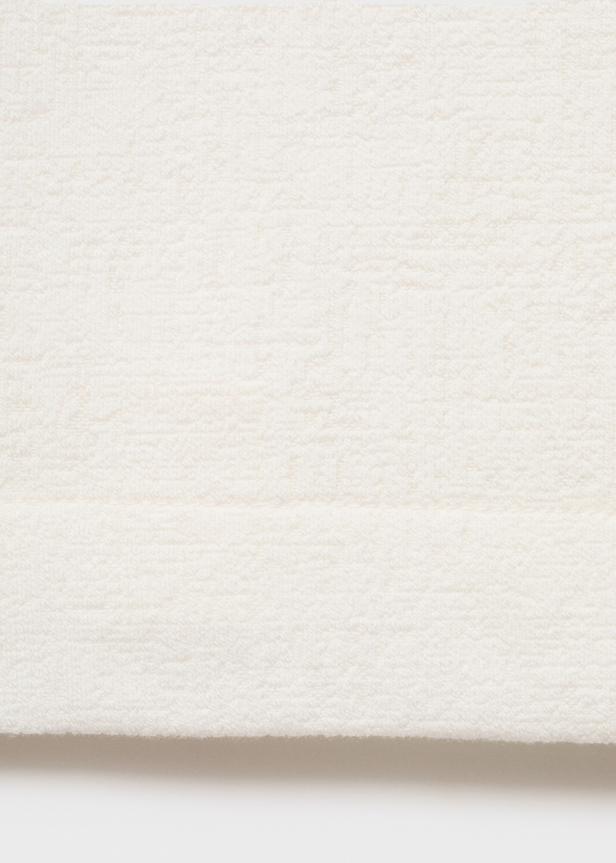 Structured knitted polo shirt - Details of the article 0