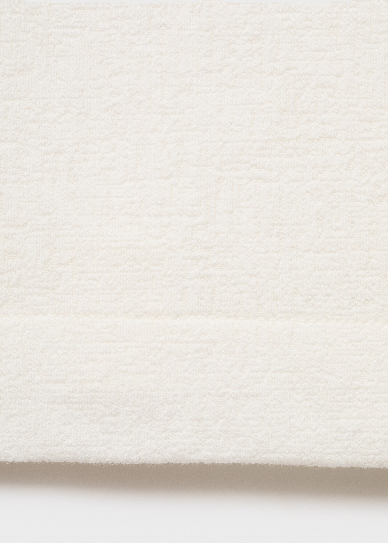 Structured knitted polo shirt - Details of the article 0
