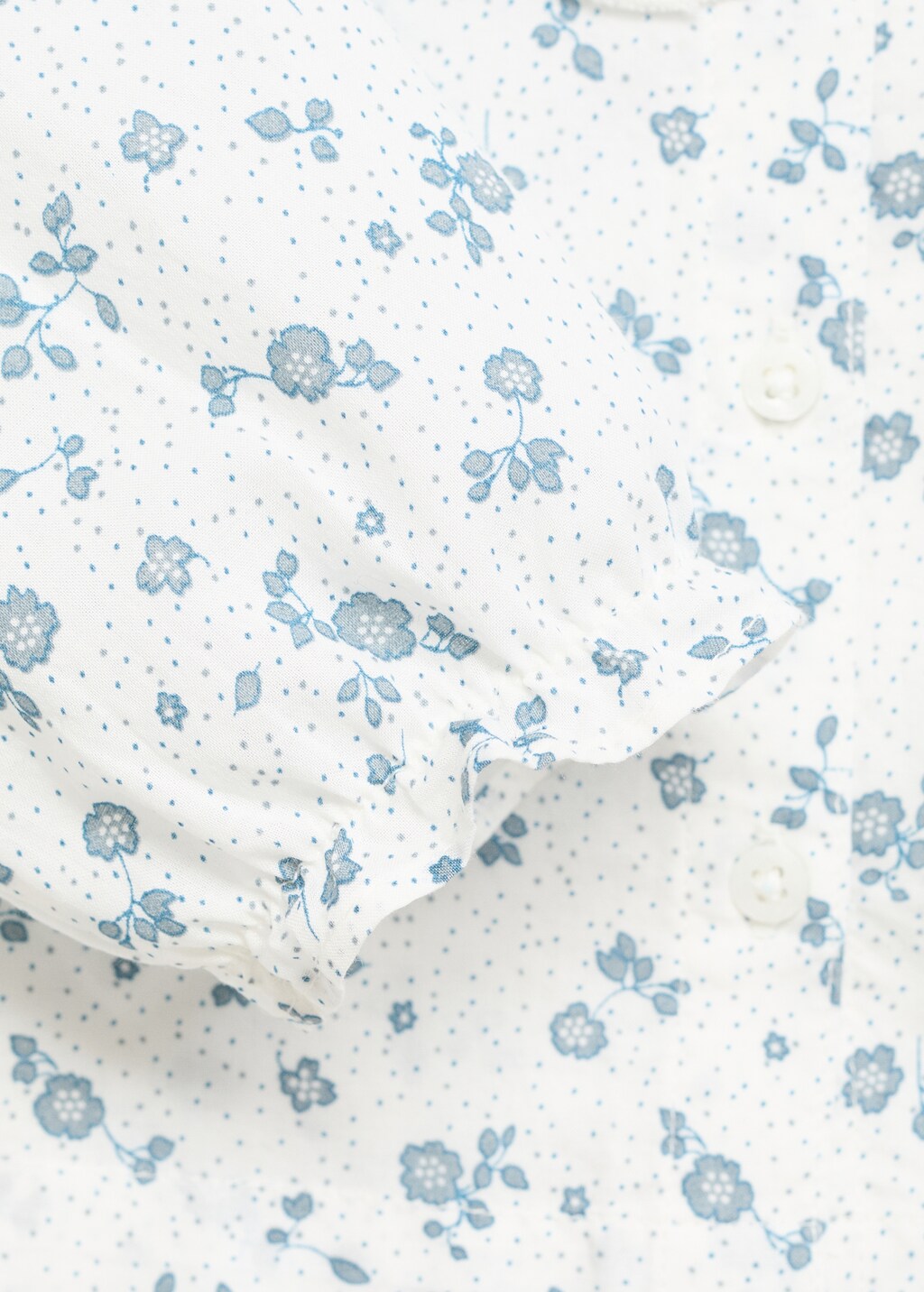 Embroidered babydoll-collar blouse