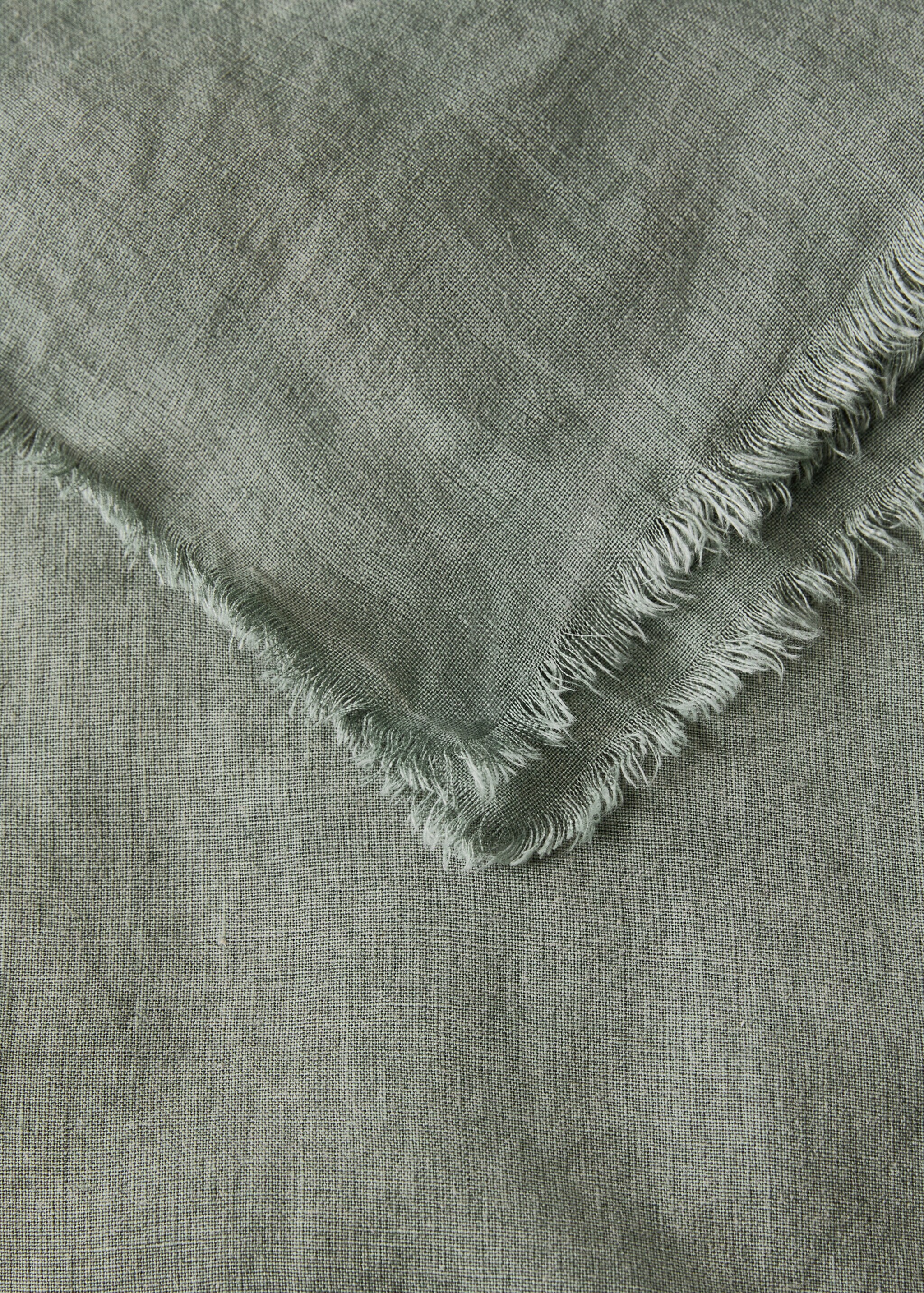 Linen tablecloth with frayed edges for 6-8 diners - Details of the article 1, Ink Blue. Ref: 17043323-00.