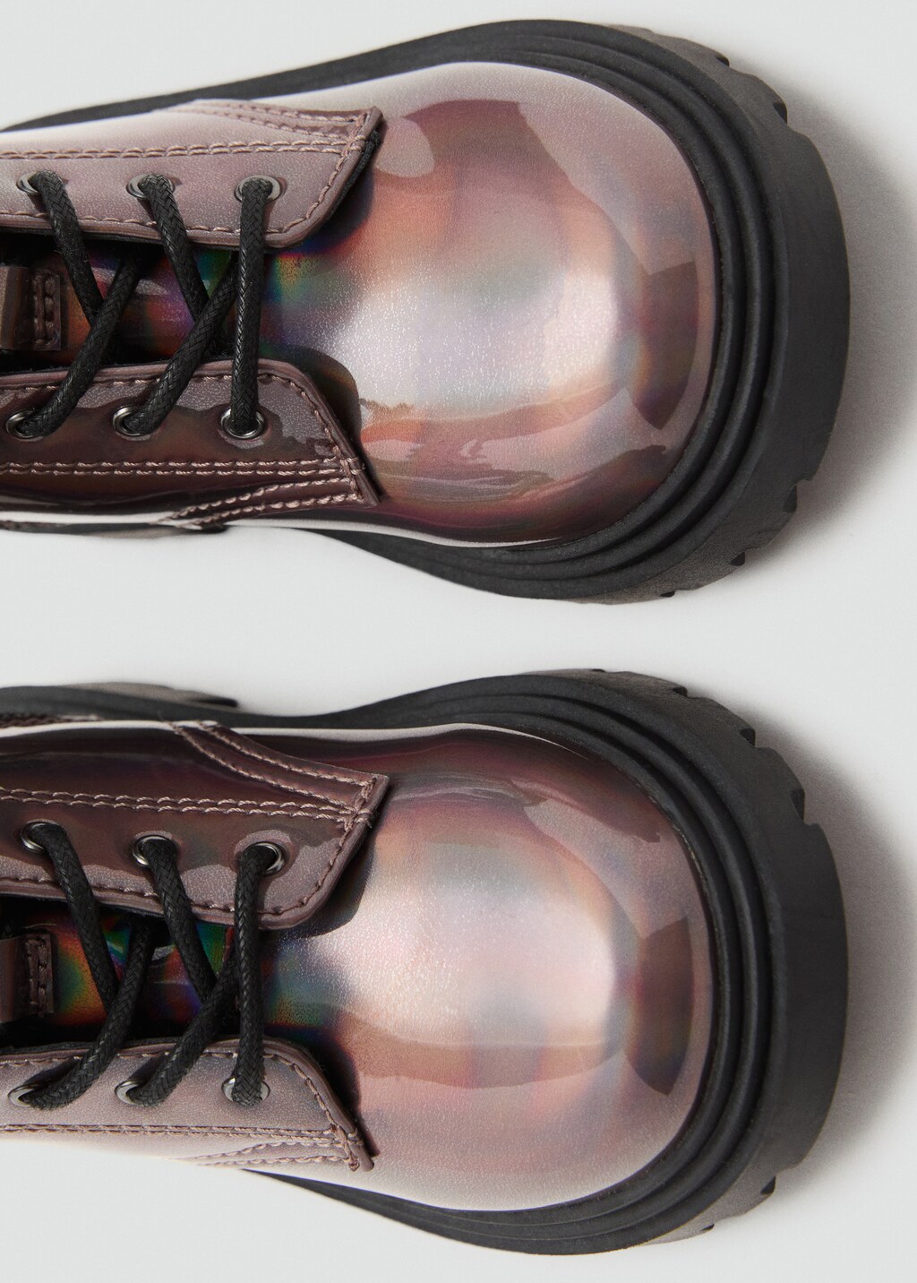 Zipped metallic boots