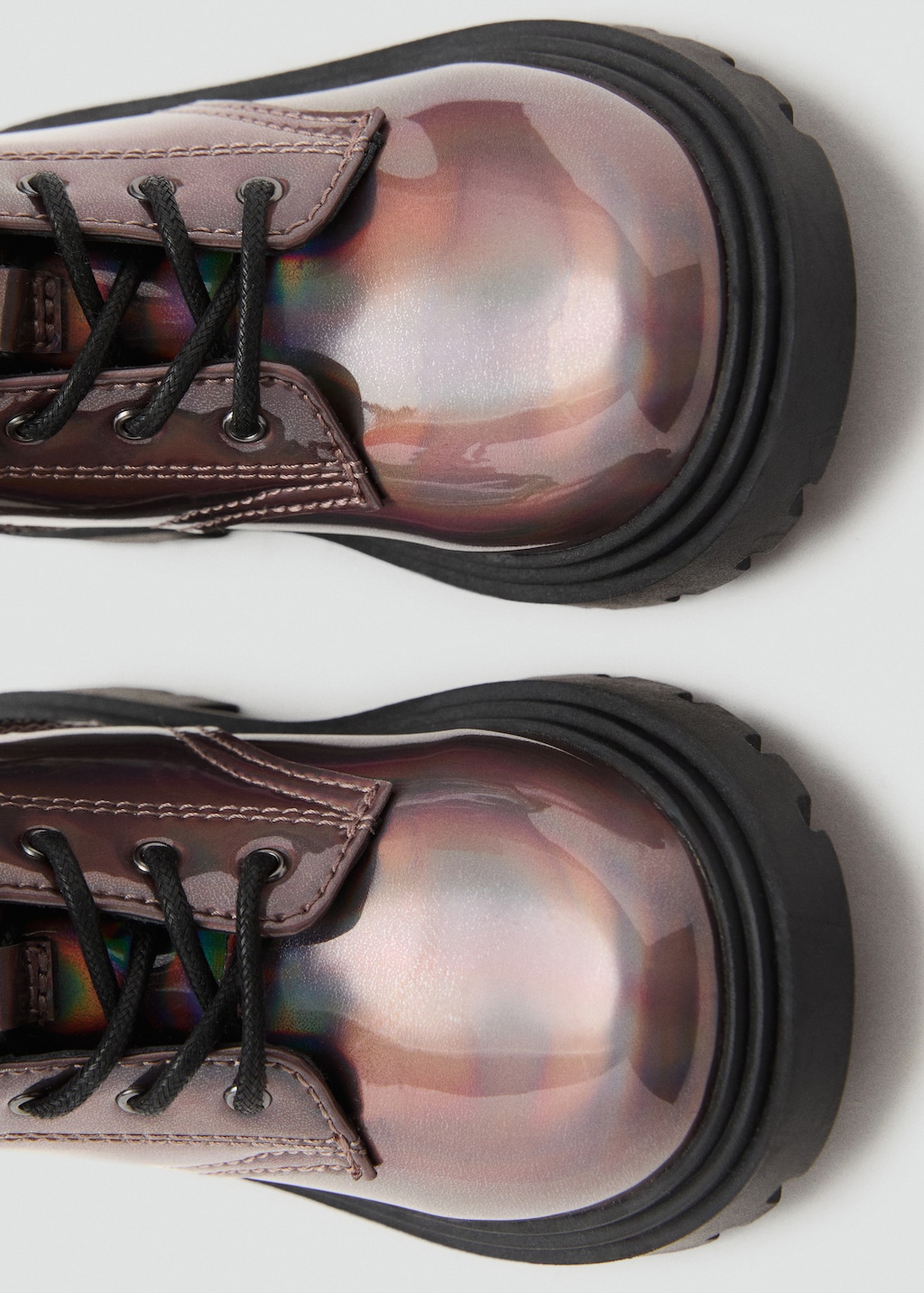 Zipped metallic boots