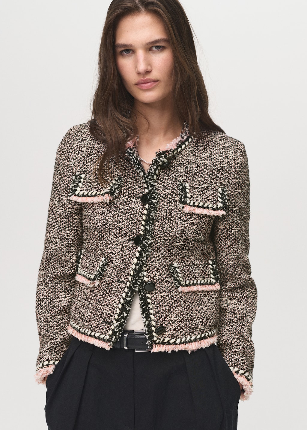 Chaqueta tweed bolsillos