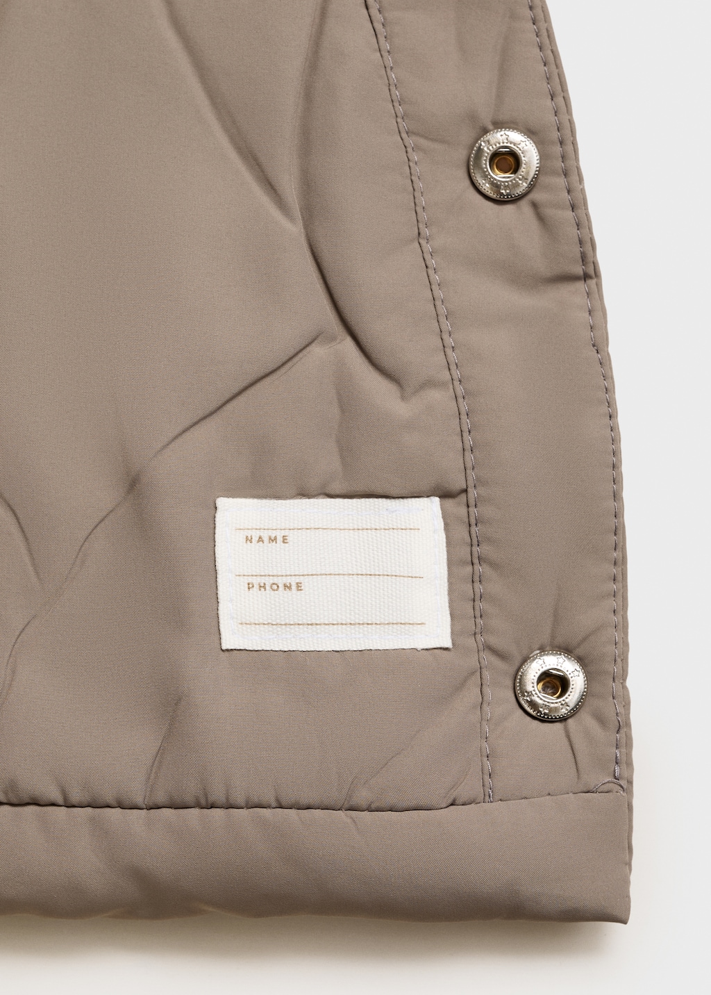 Quilted coat with ear flaps