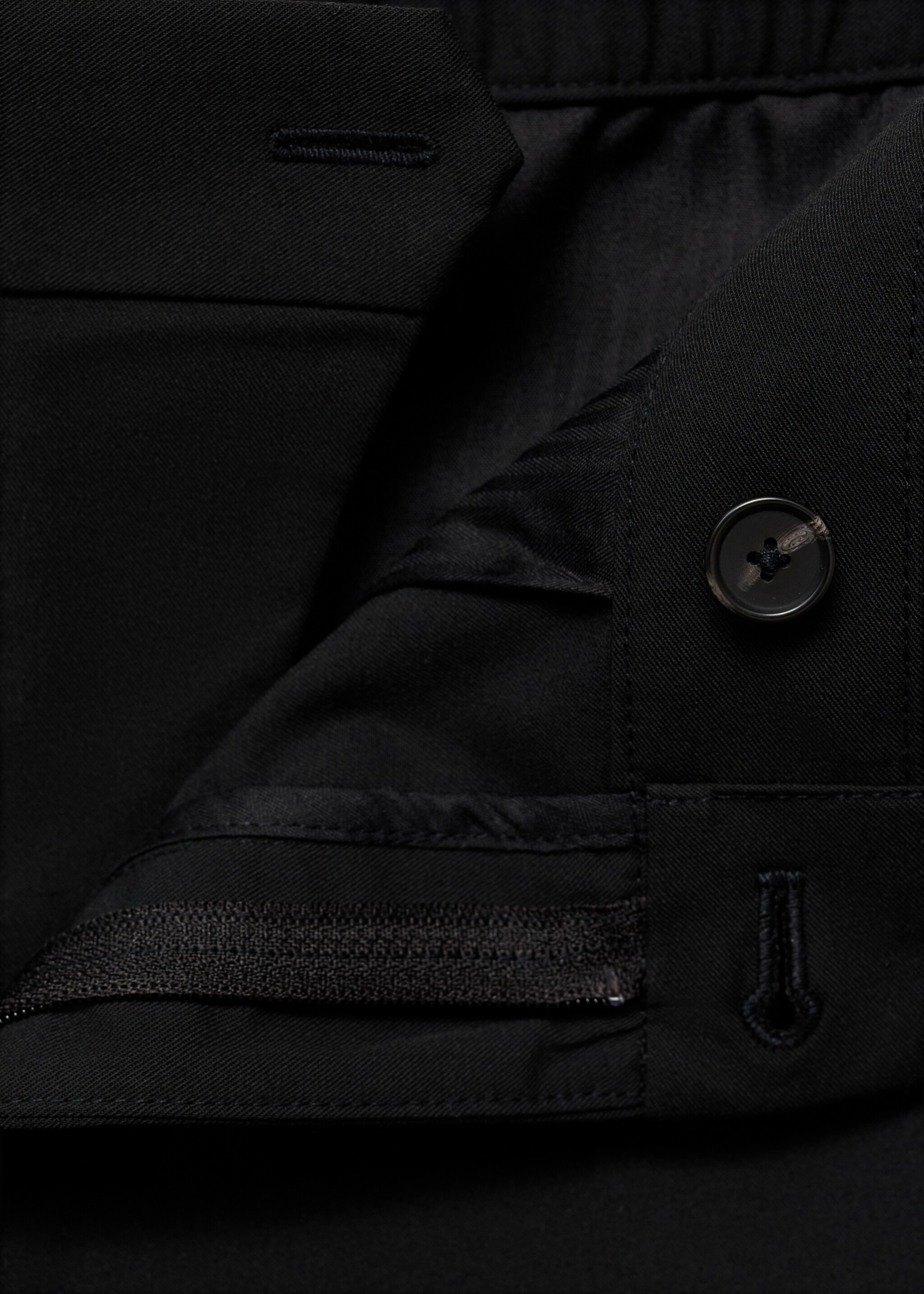 Stretch fabric slim-fit trousers - Details of the article 8, Black. Ref: 17045140-00.