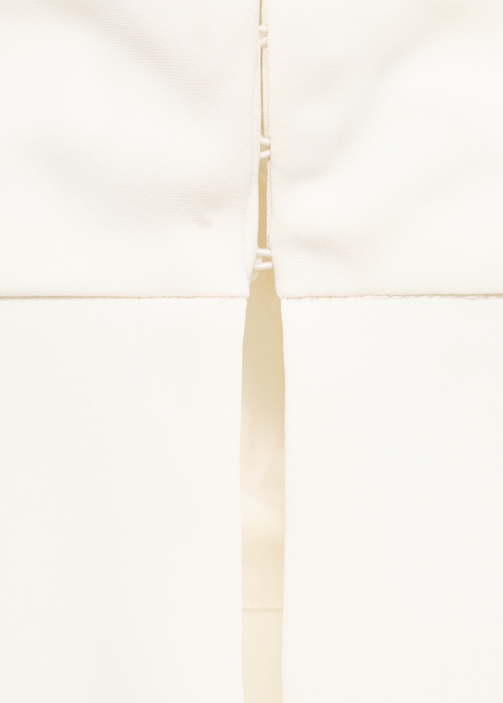 High-neck blouse with asymmetrical sleeves