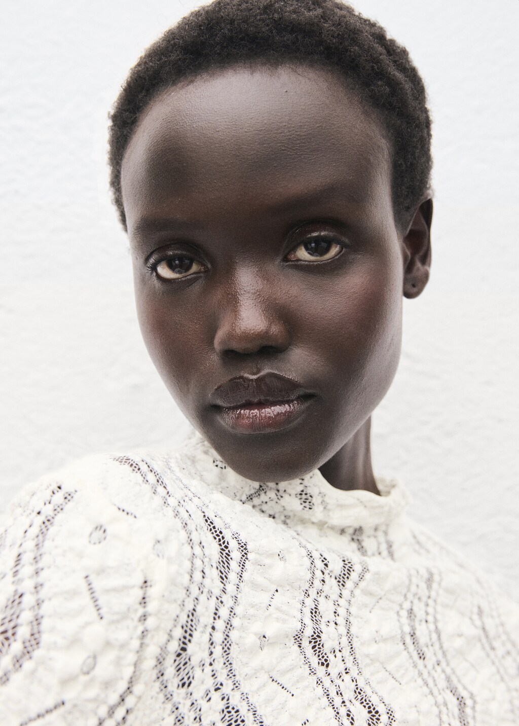 Sweater with perkins collar and lace design