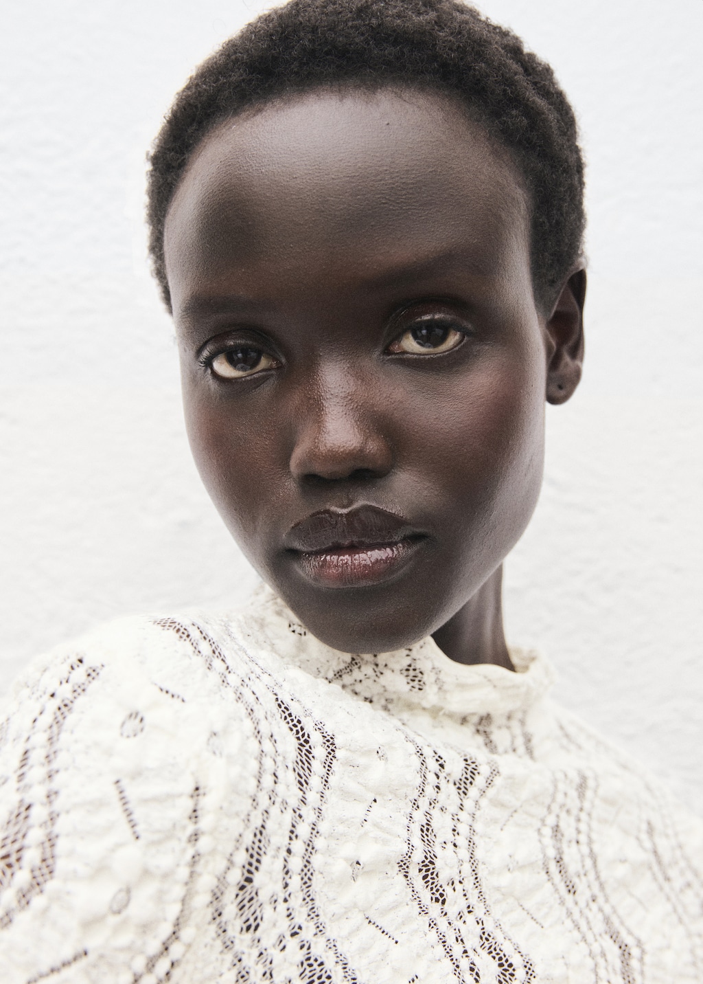 Sweater with perkins collar and lace design