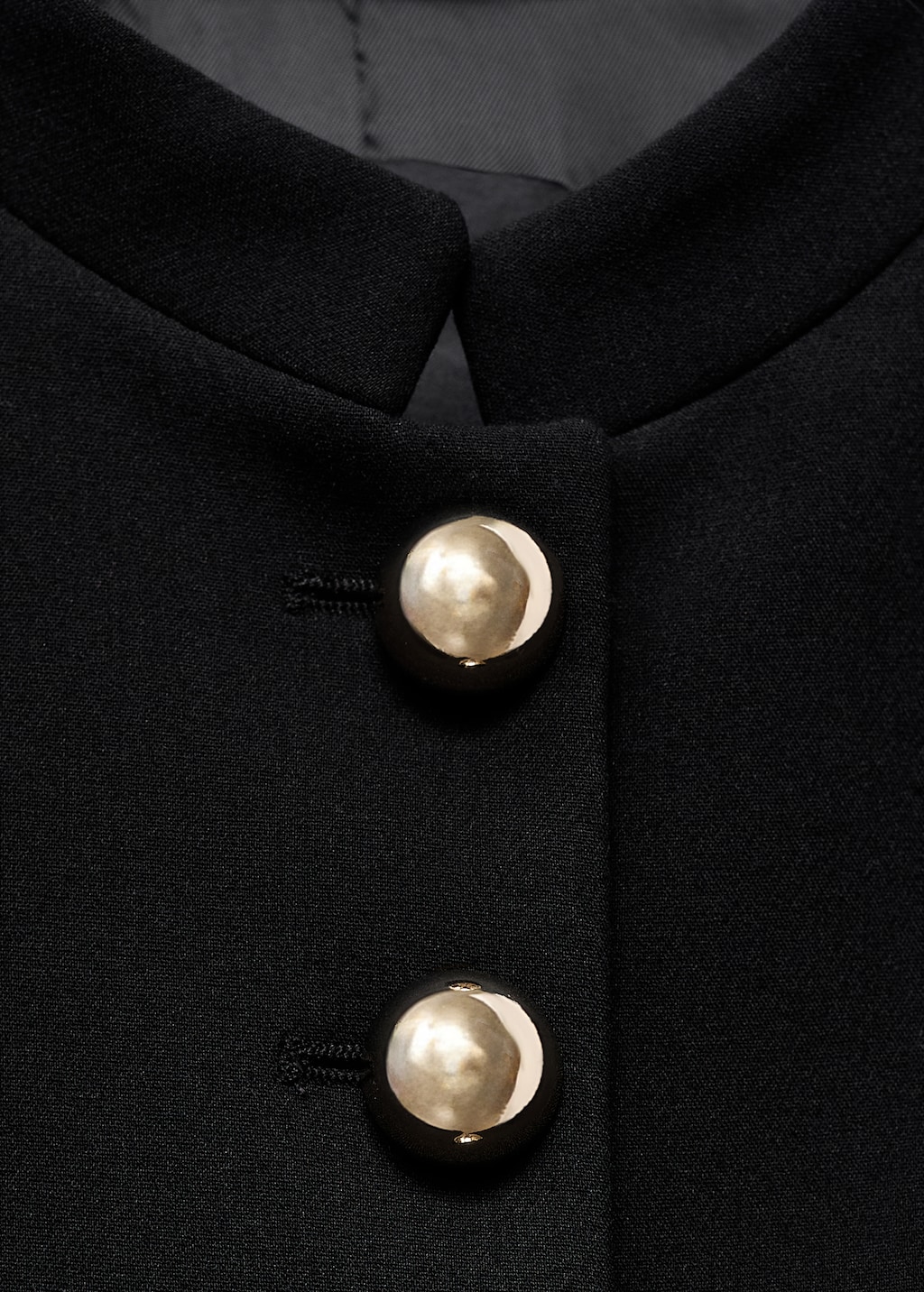 Jacket with jewel-button strip collar