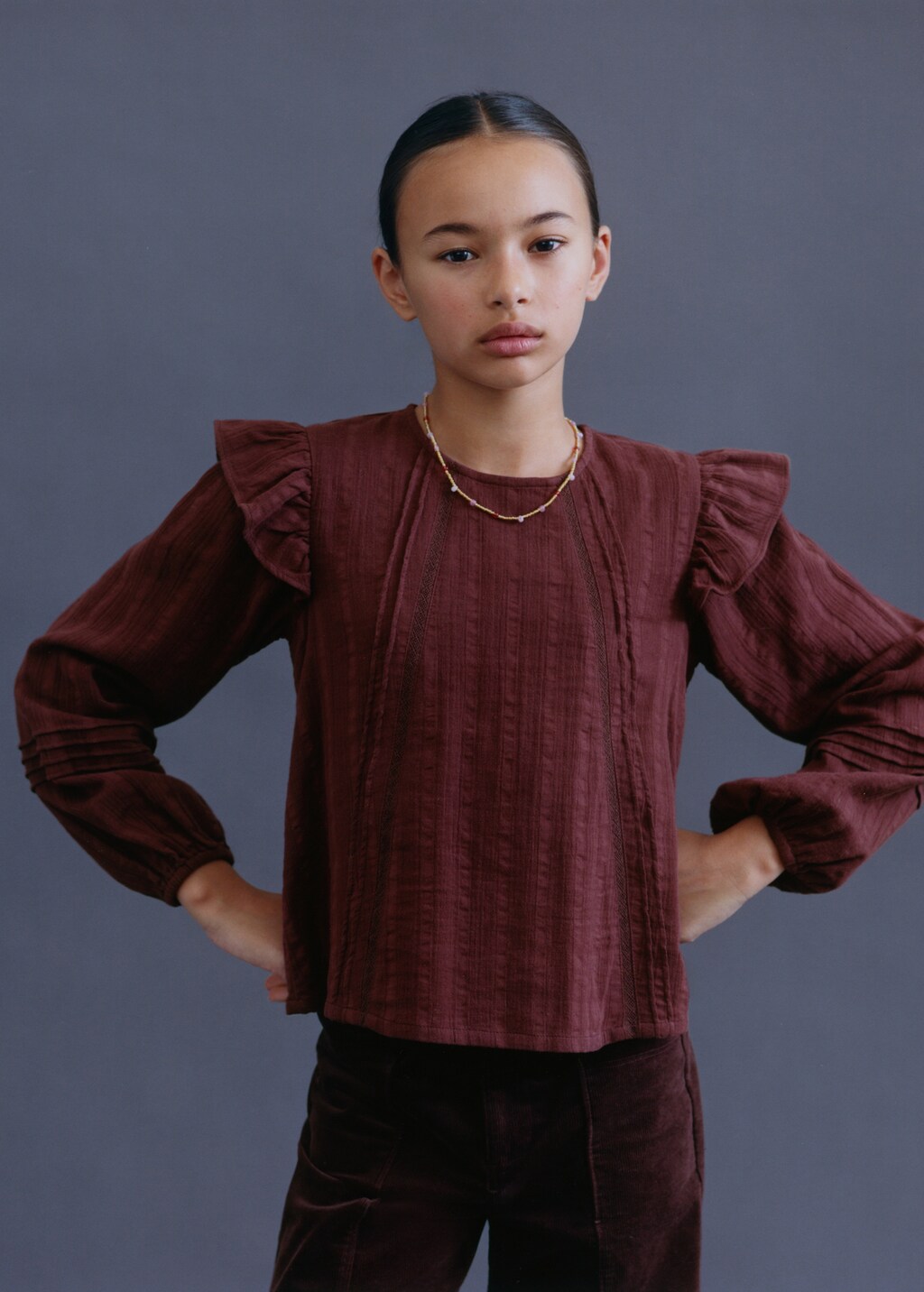 Blouse with pleat detail