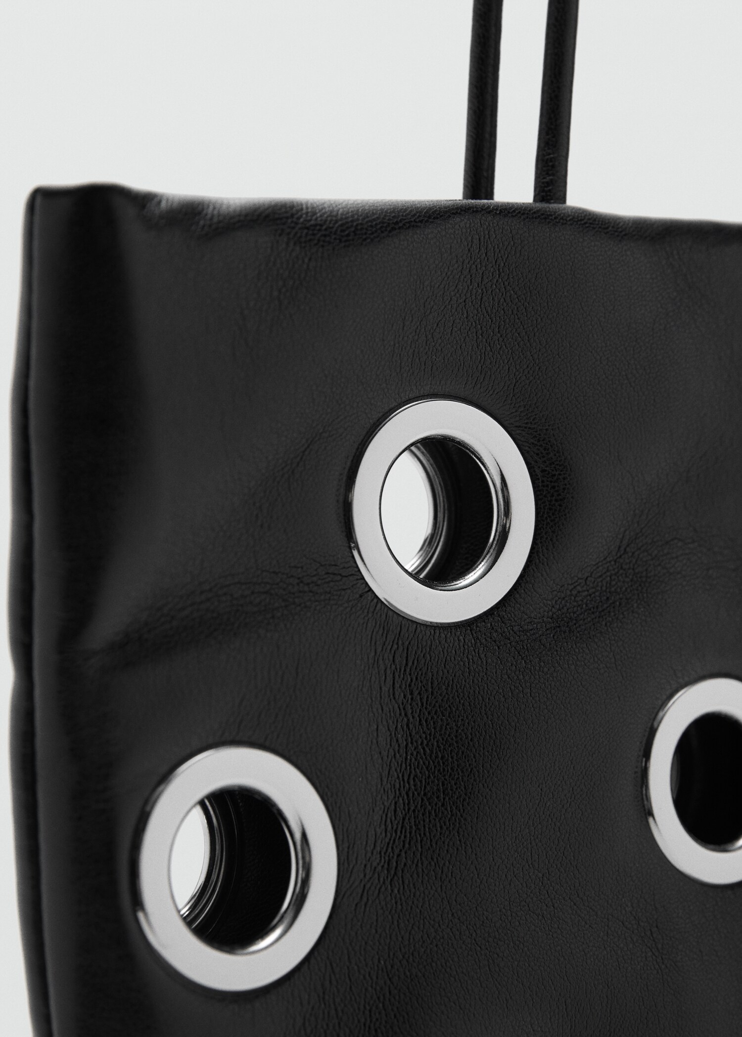 Shoulder bag with eyelets - Details of the article 1