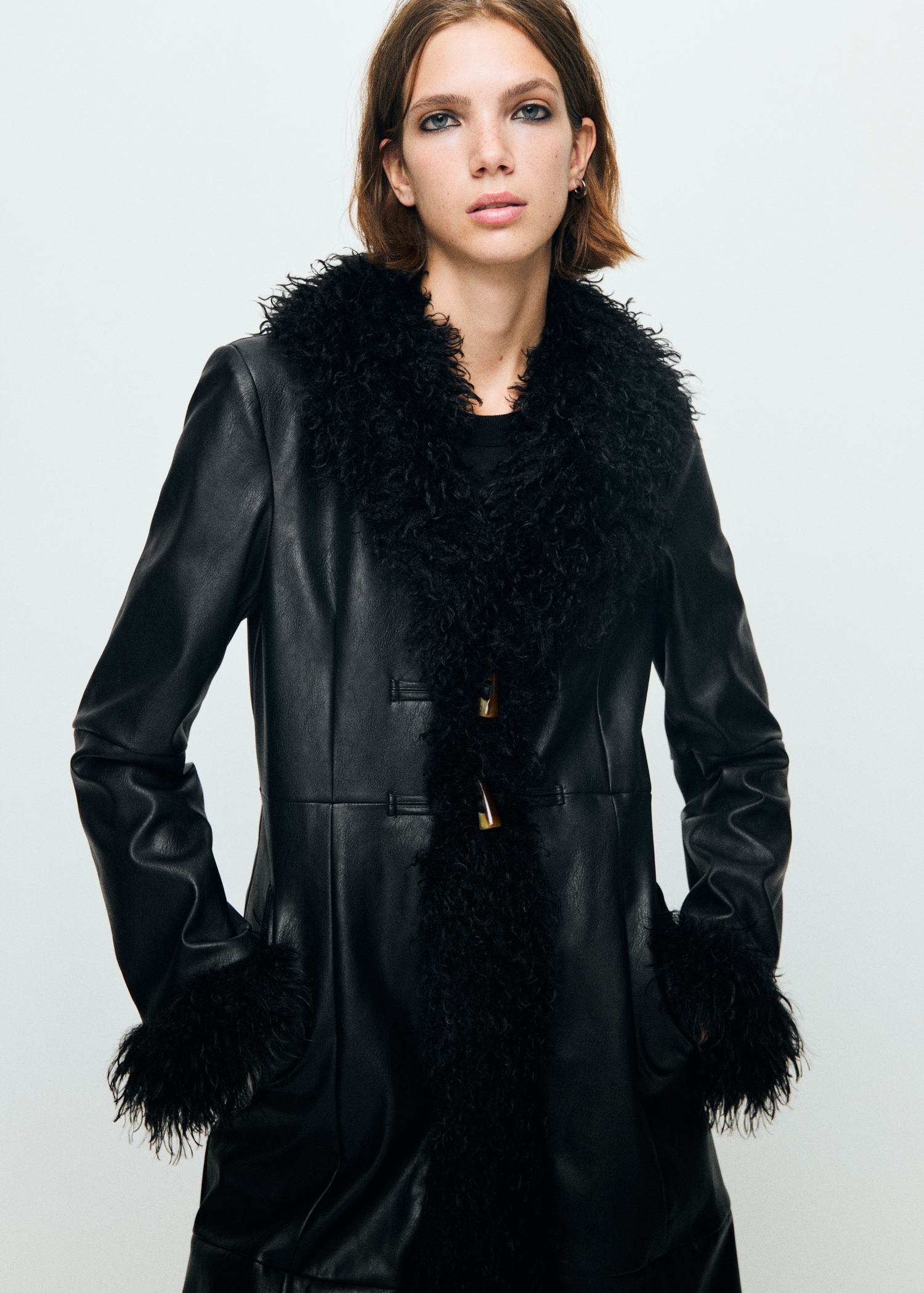 Faux-leather coat with fur trim Women MANGO Indonesia