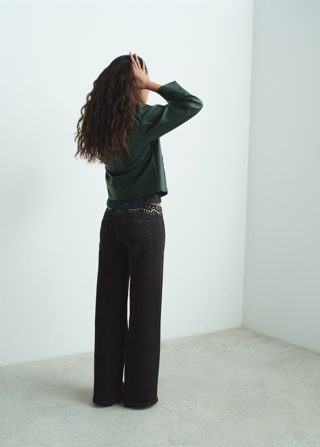 Low-waist studded jeans