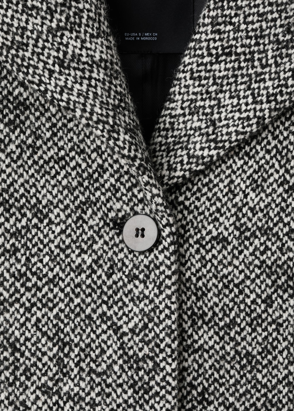 Mottled coat with fur collar