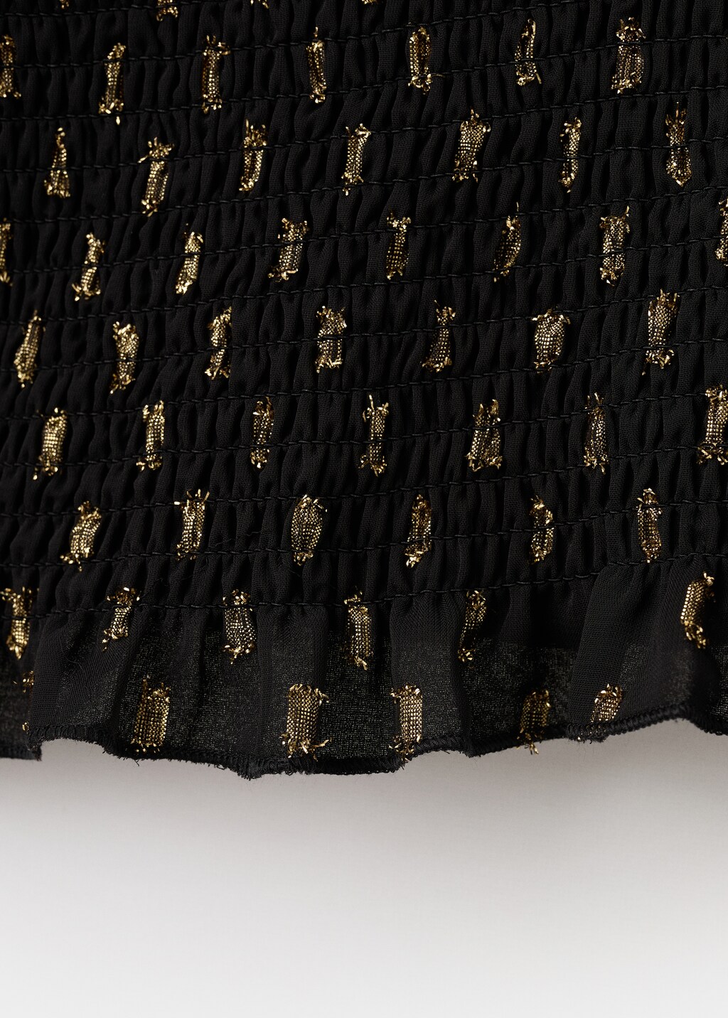 Asymmetrical lurex top