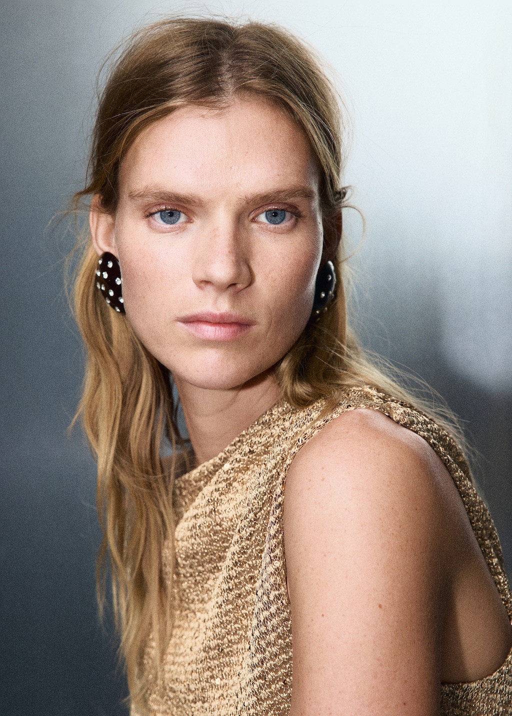 Asymmetric sequin top